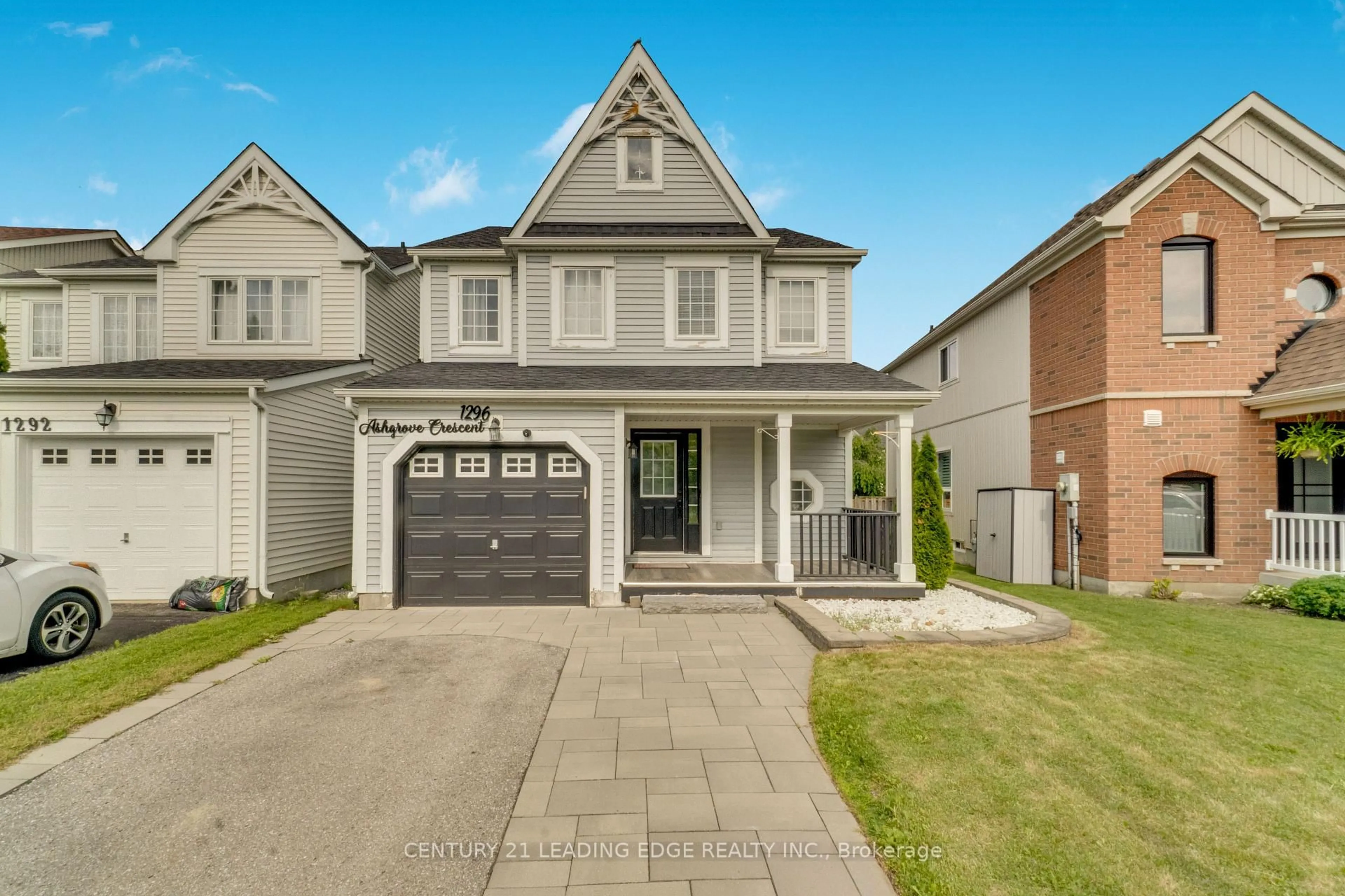 Home with brick exterior material, street for 1296 Ashgrove Cres, Oshawa Ontario L1K 3A6