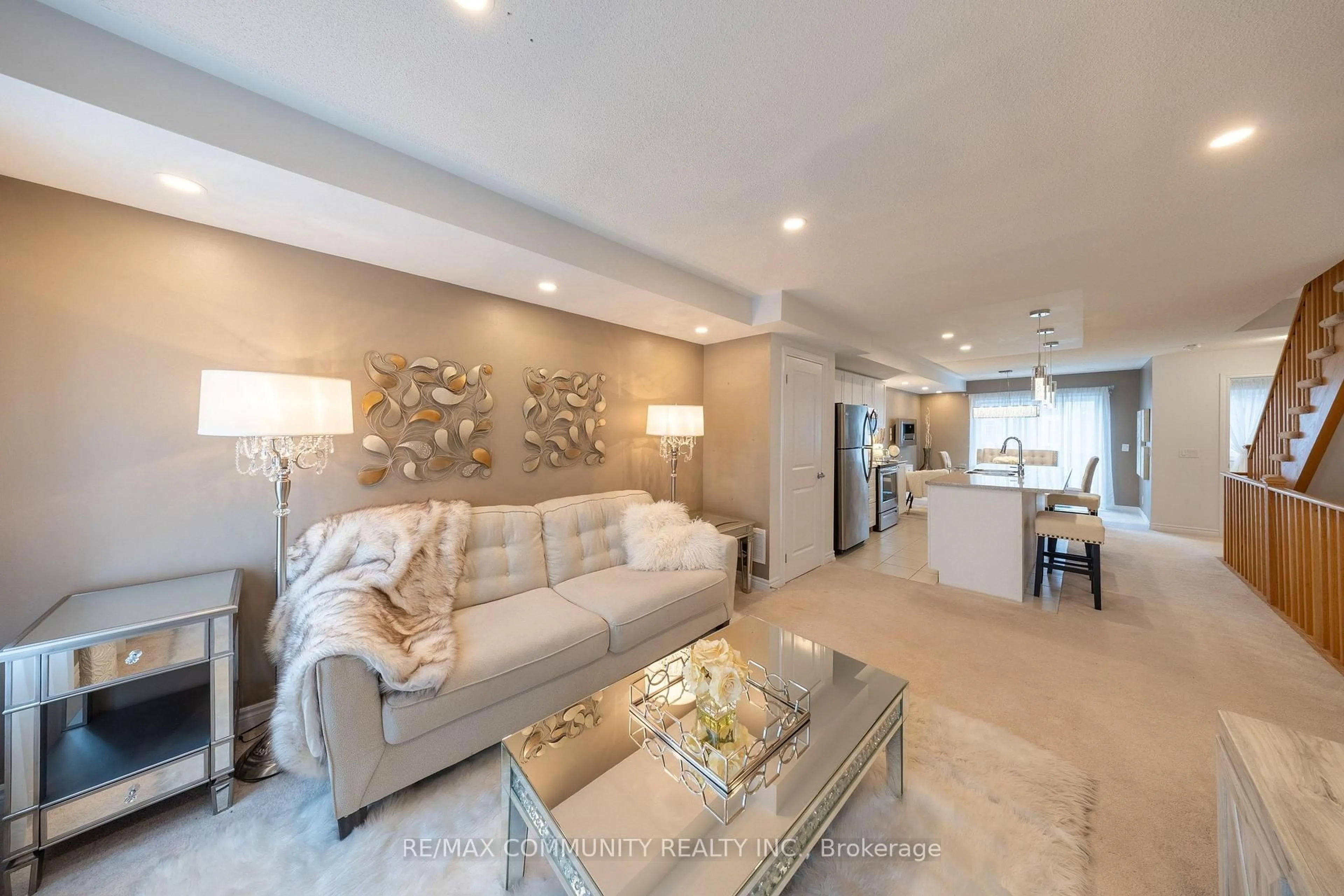 Living room with furniture, ceramic/tile floor for 2500 Hill Rise Crt #128, Oshawa Ontario L1L 0M6