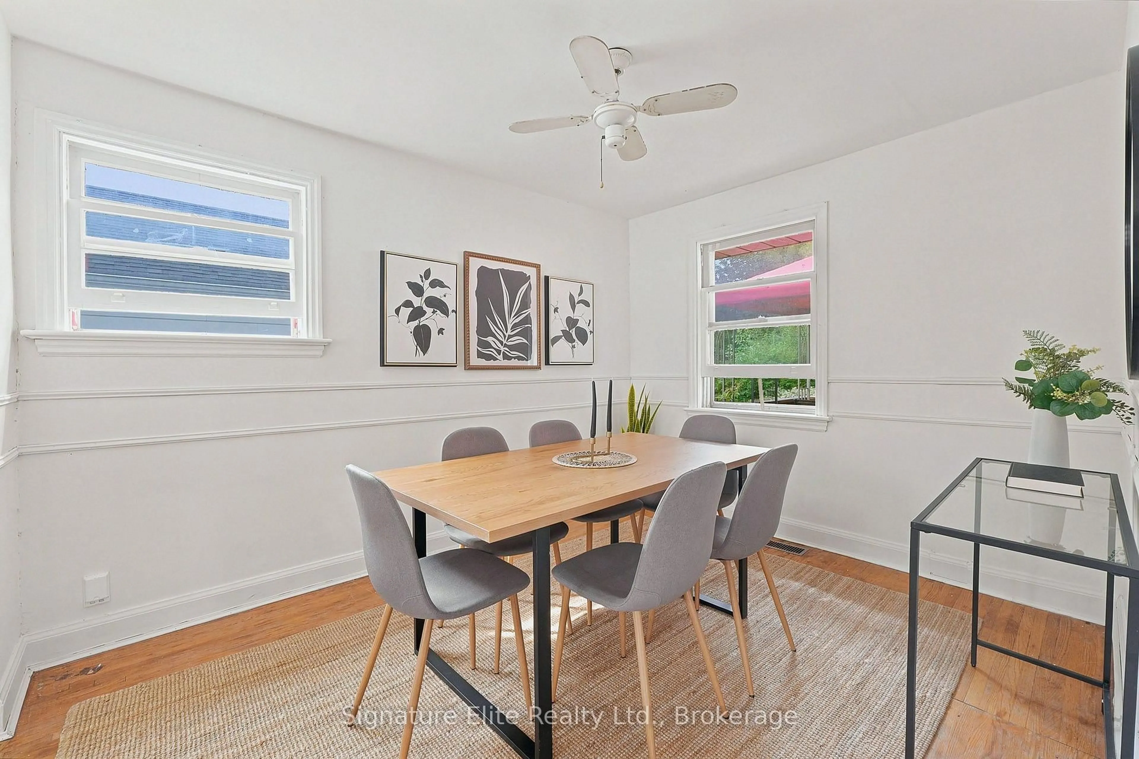Dining room, wood/laminate floor for 76 Harewood Ave, Toronto Ontario M1M 2R3