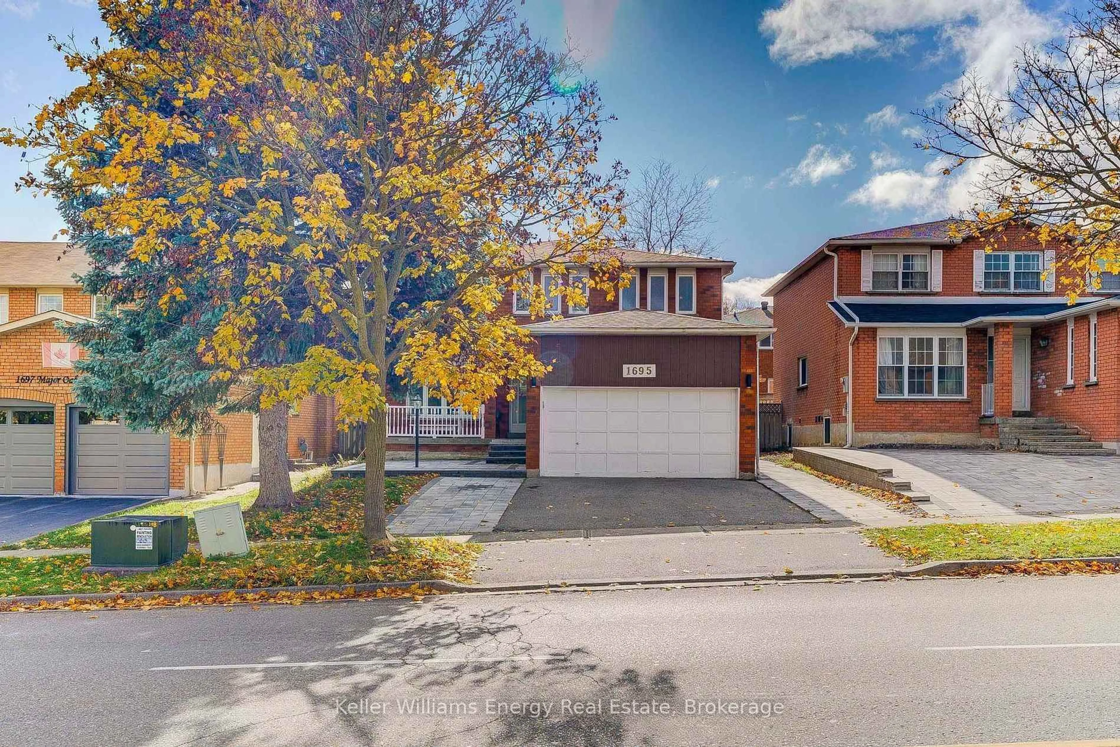 Home with brick exterior material, street for 1695 Major Oaks Rd, Pickering Ontario L1X 1X2