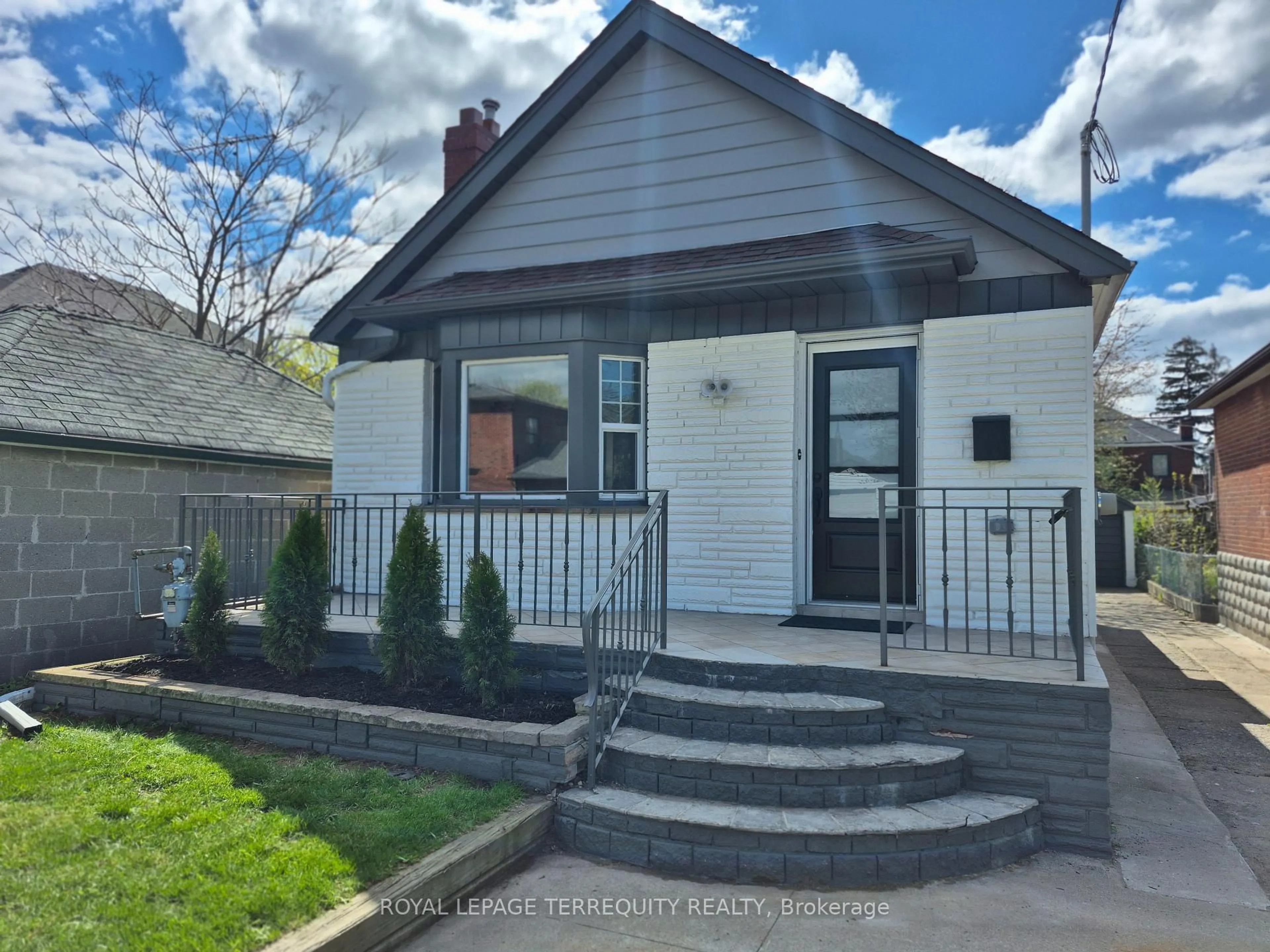 Home with vinyl exterior material, street for 40 Leroy Ave, Toronto Ontario M4J 4G8