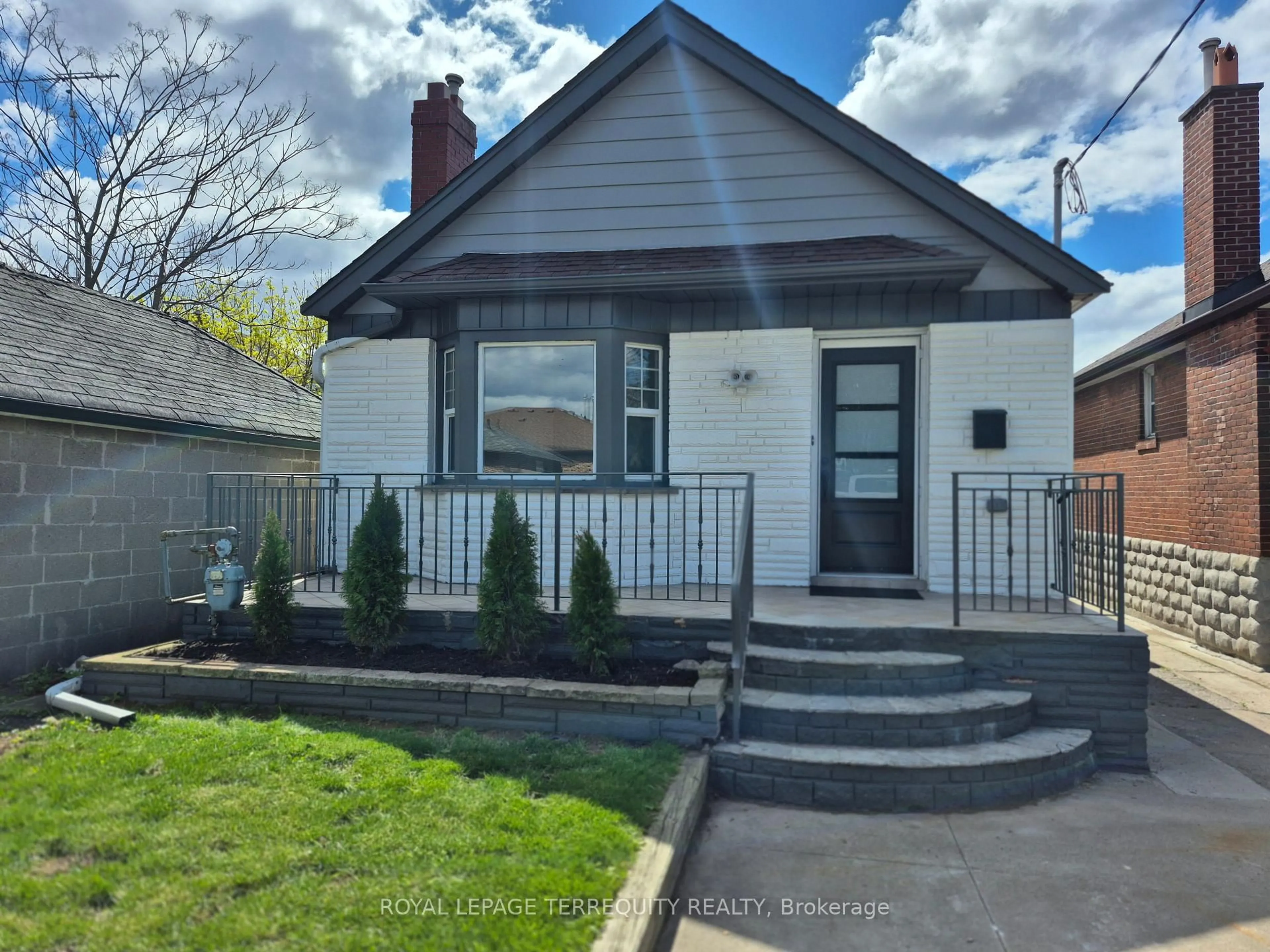 Home with vinyl exterior material, street for 40 Leroy Ave, Toronto Ontario M4J 4G8