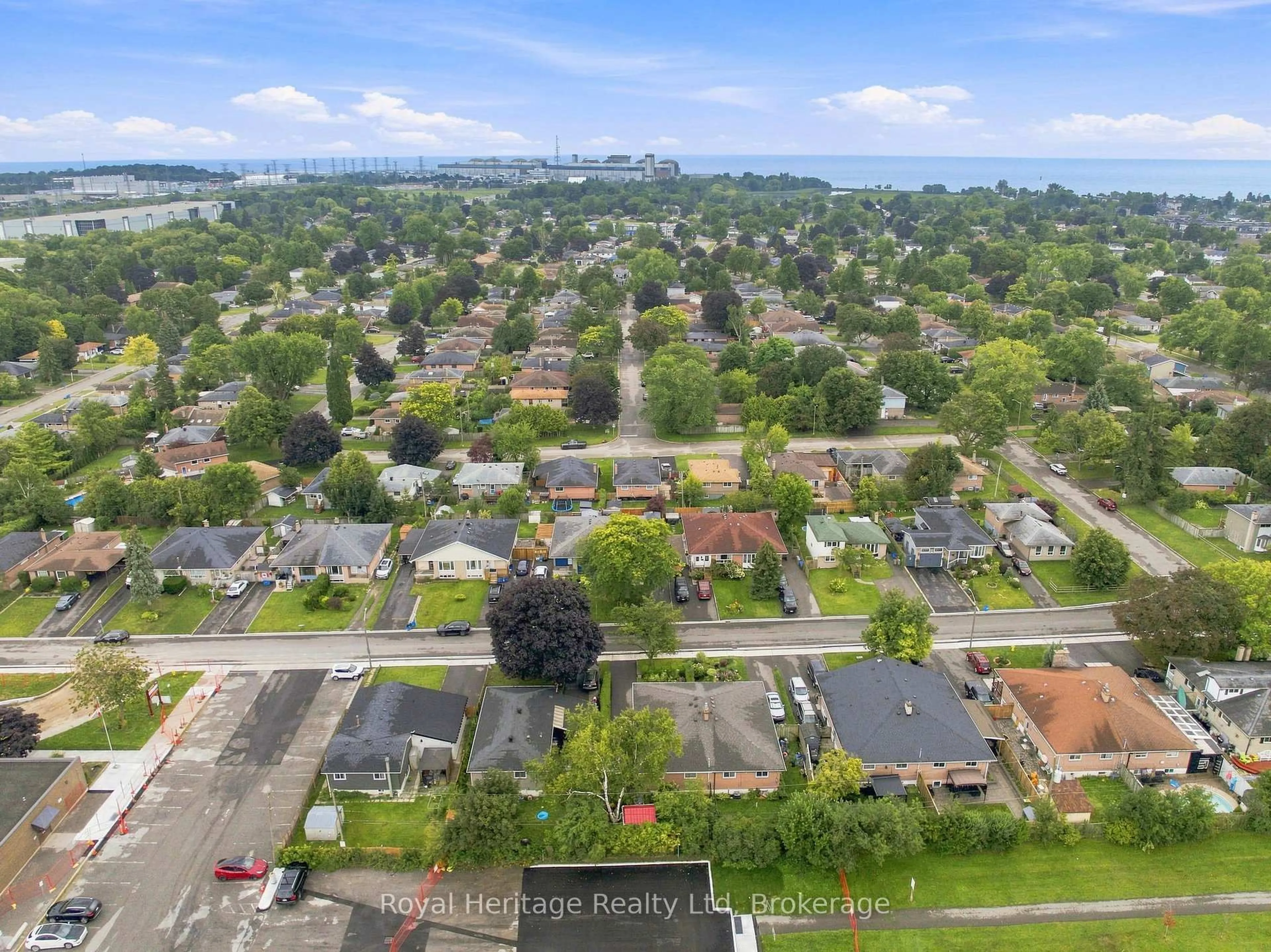 A pic from outside/outdoor area/front of a property/back of a property/a pic from drone, water/lake/river/ocean view for 1387 Garvolin Ave, Pickering Ontario L1W 1J7