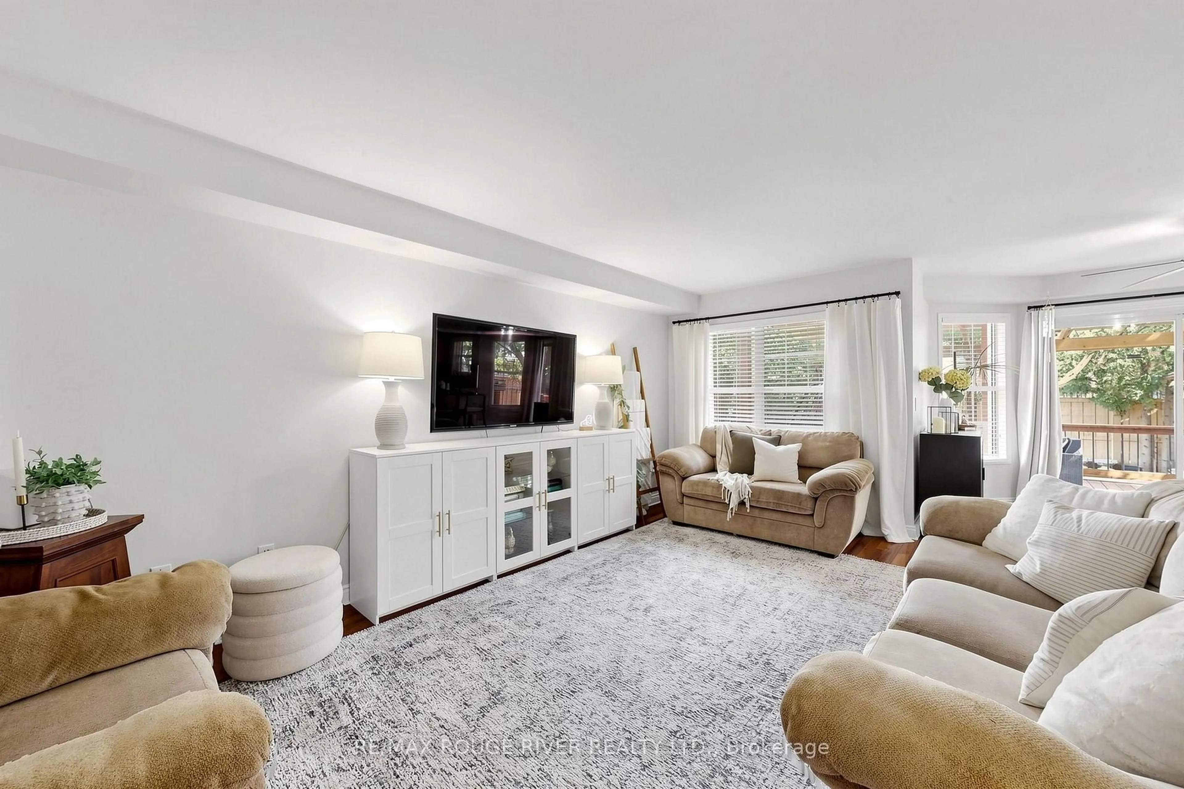 Living room with furniture, carpet floor for 66 Tidewater Cres, Whitby Ontario L1P 1M3