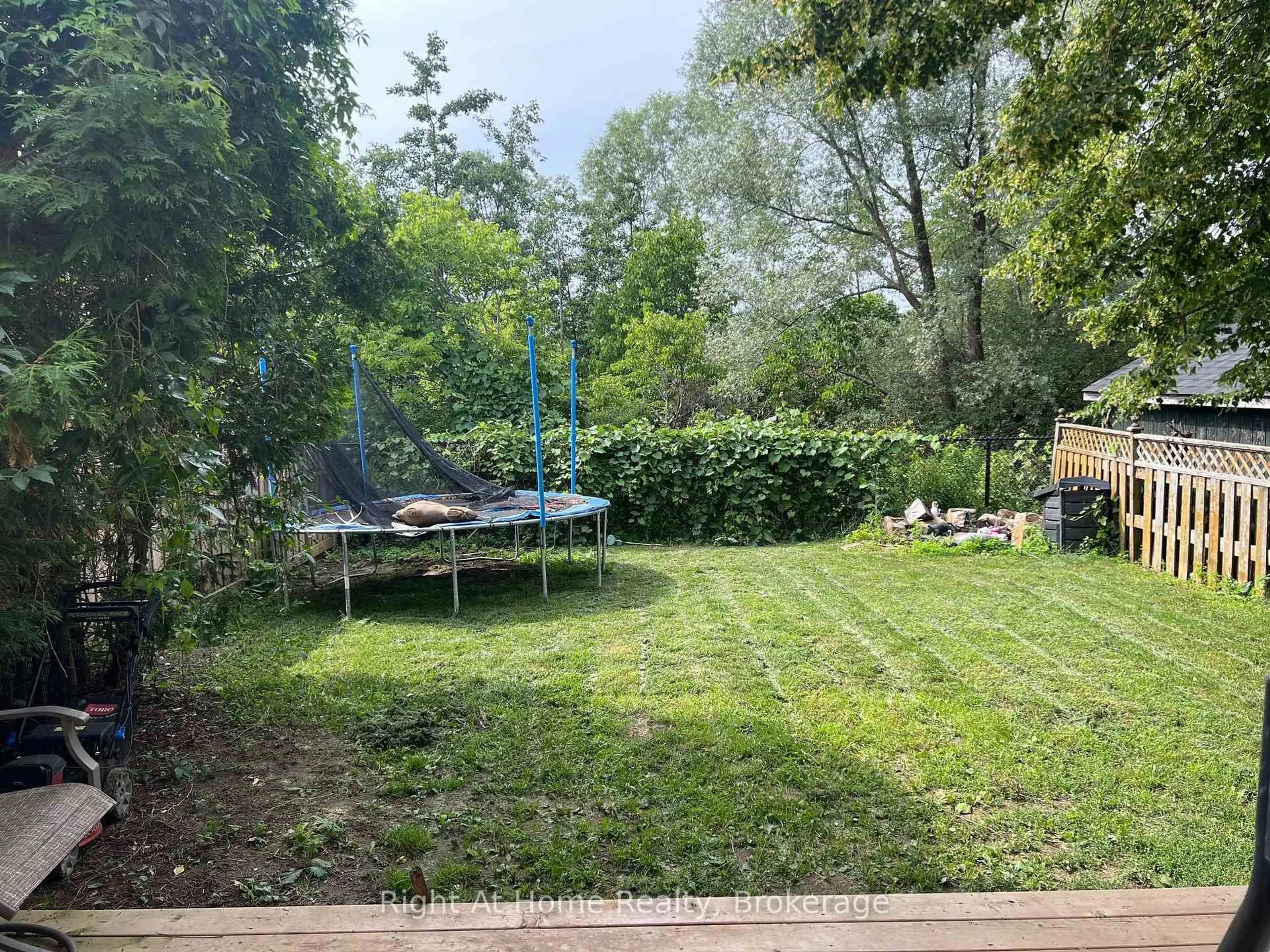A pic from outside/outdoor area/front of a property/back of a property/a pic from drone, forest/trees view for 26 Moyse Dr, Clarington Ontario L1E 2V4