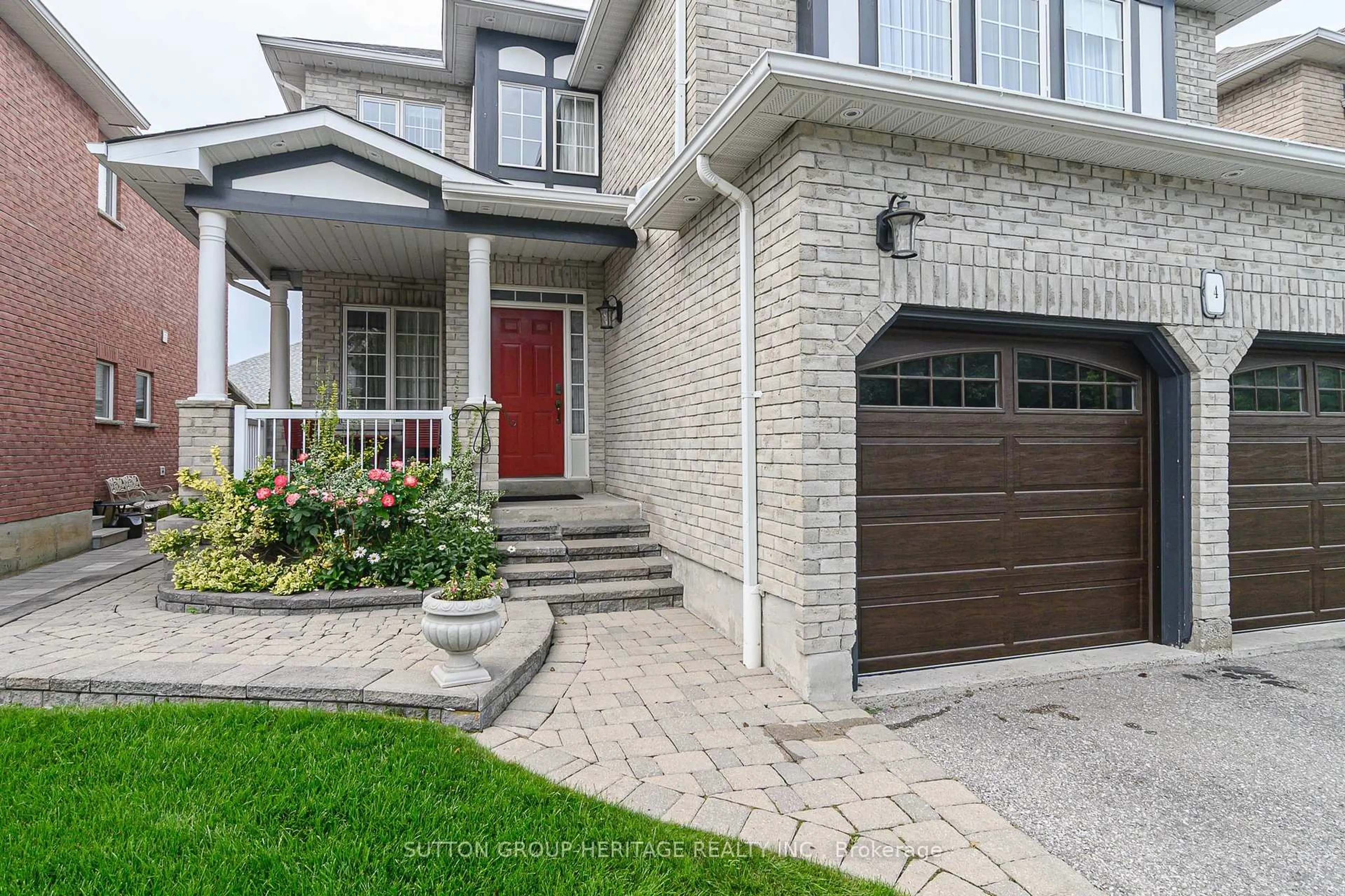 Home with brick exterior material, street for 4 Divine Dr, Whitby Ontario L1R 2T4