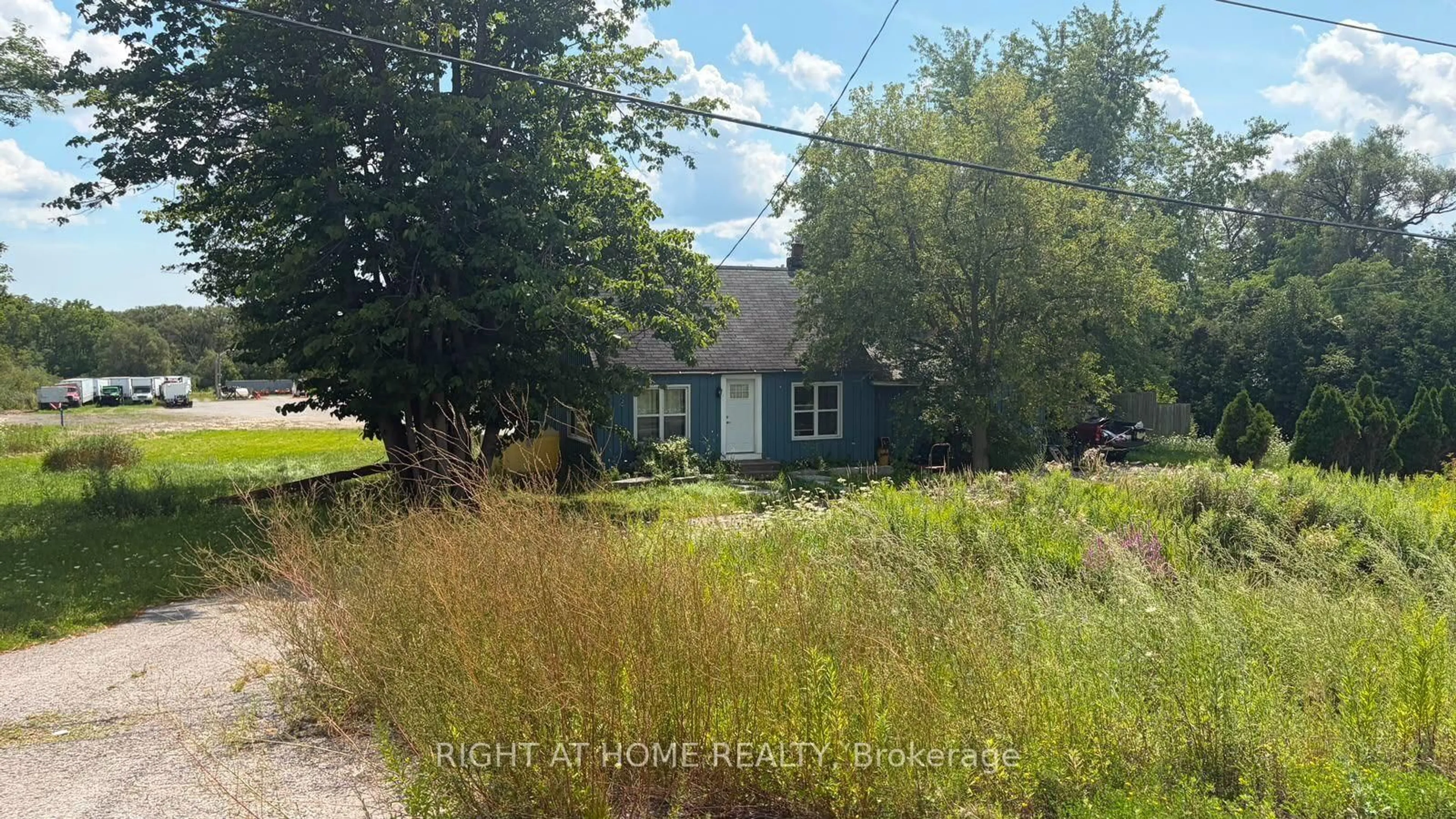A pic from outside/outdoor area/front of a property/back of a property/a pic from drone, street for 3315 Hwy 7 Highway, Pickering Ontario L1X 2W3