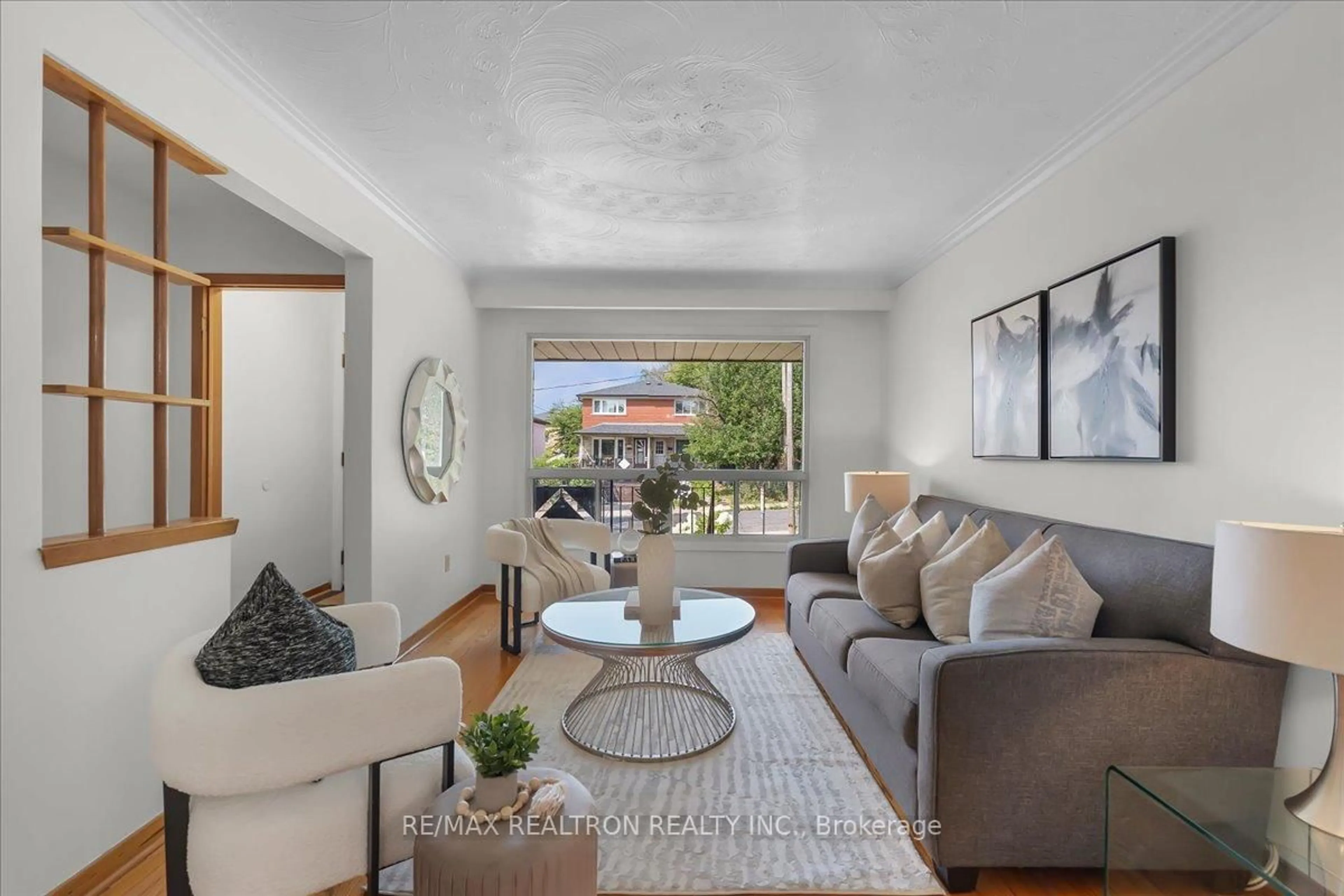 Living room with furniture, unknown for 283 Hiawatha Rd, Toronto Ontario M4L 2Y3
