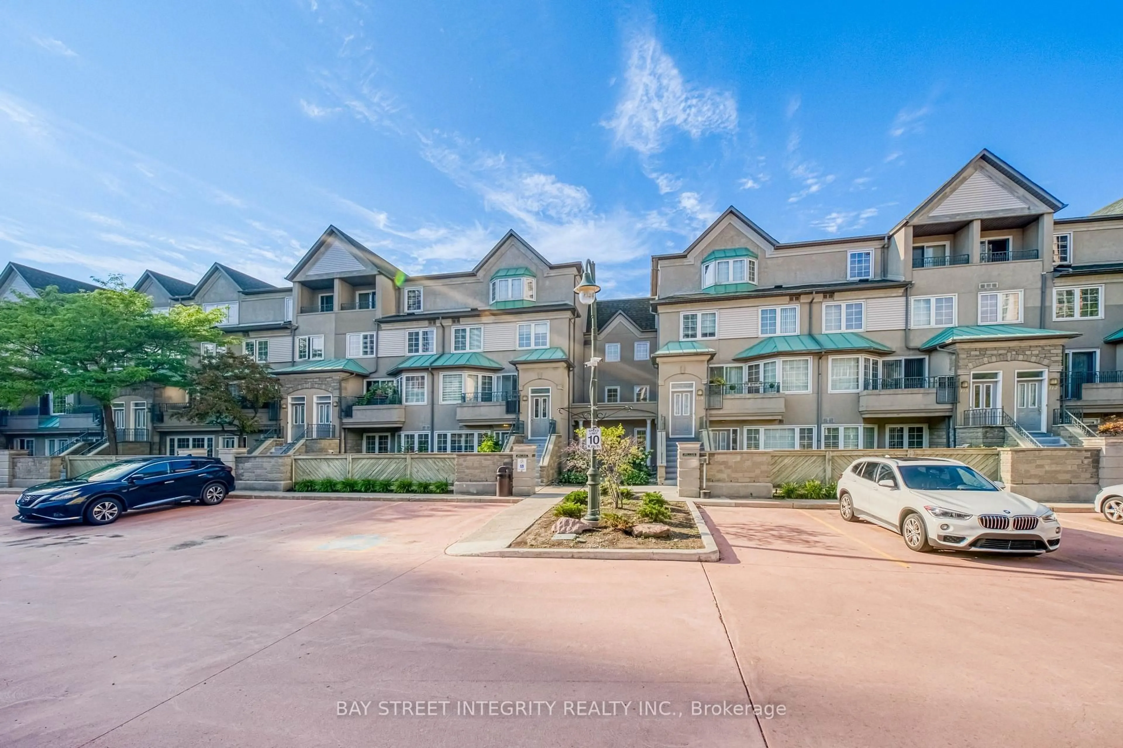 A pic from outside/outdoor area/front of a property/back of a property/a pic from drone, mountain view for 188 Bonis Ave #202, Toronto Ontario M1T 3W1