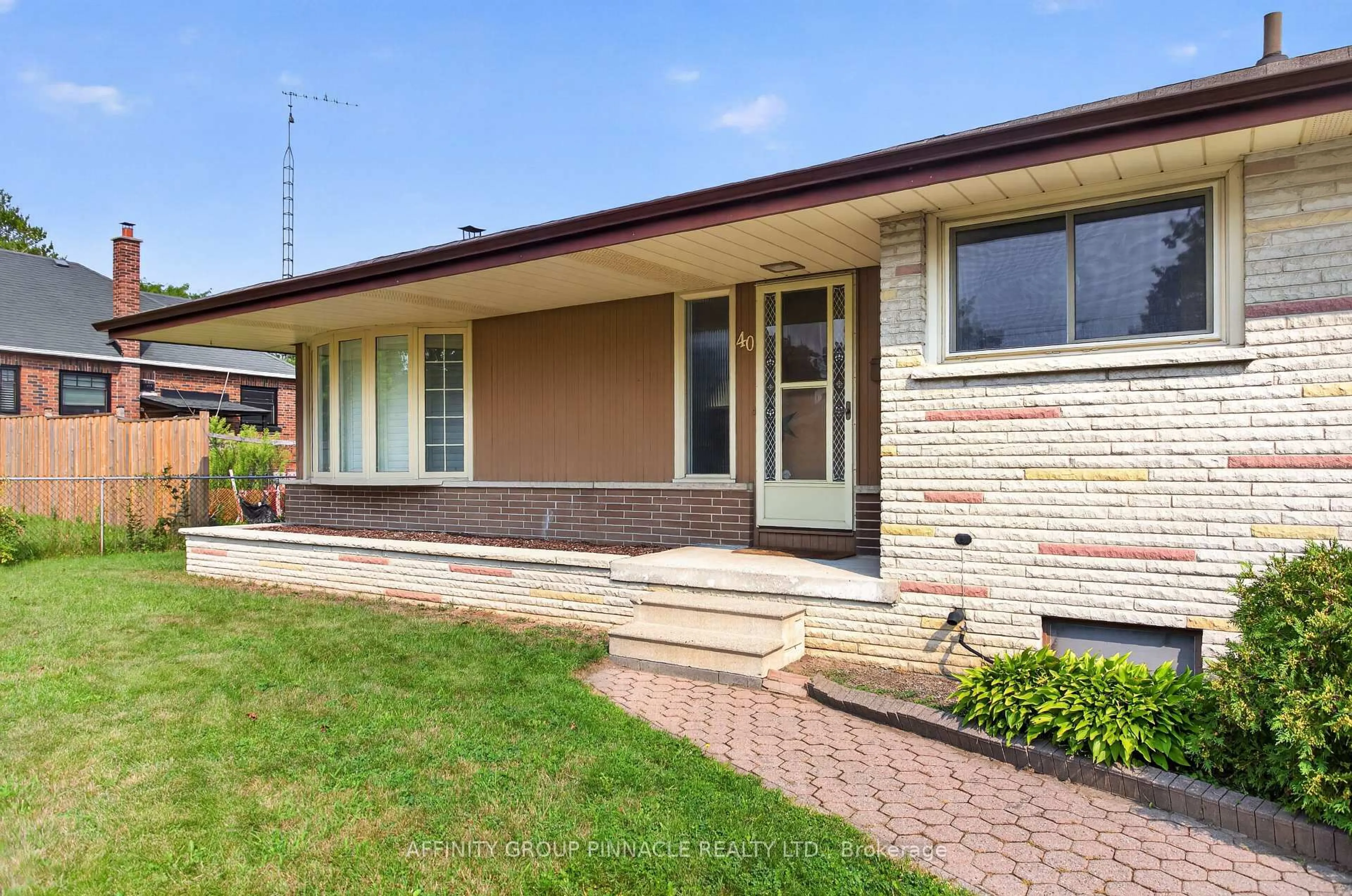 Home with brick exterior material, street for 40 Switzer Dr, Oshawa Ontario L1G 3J1