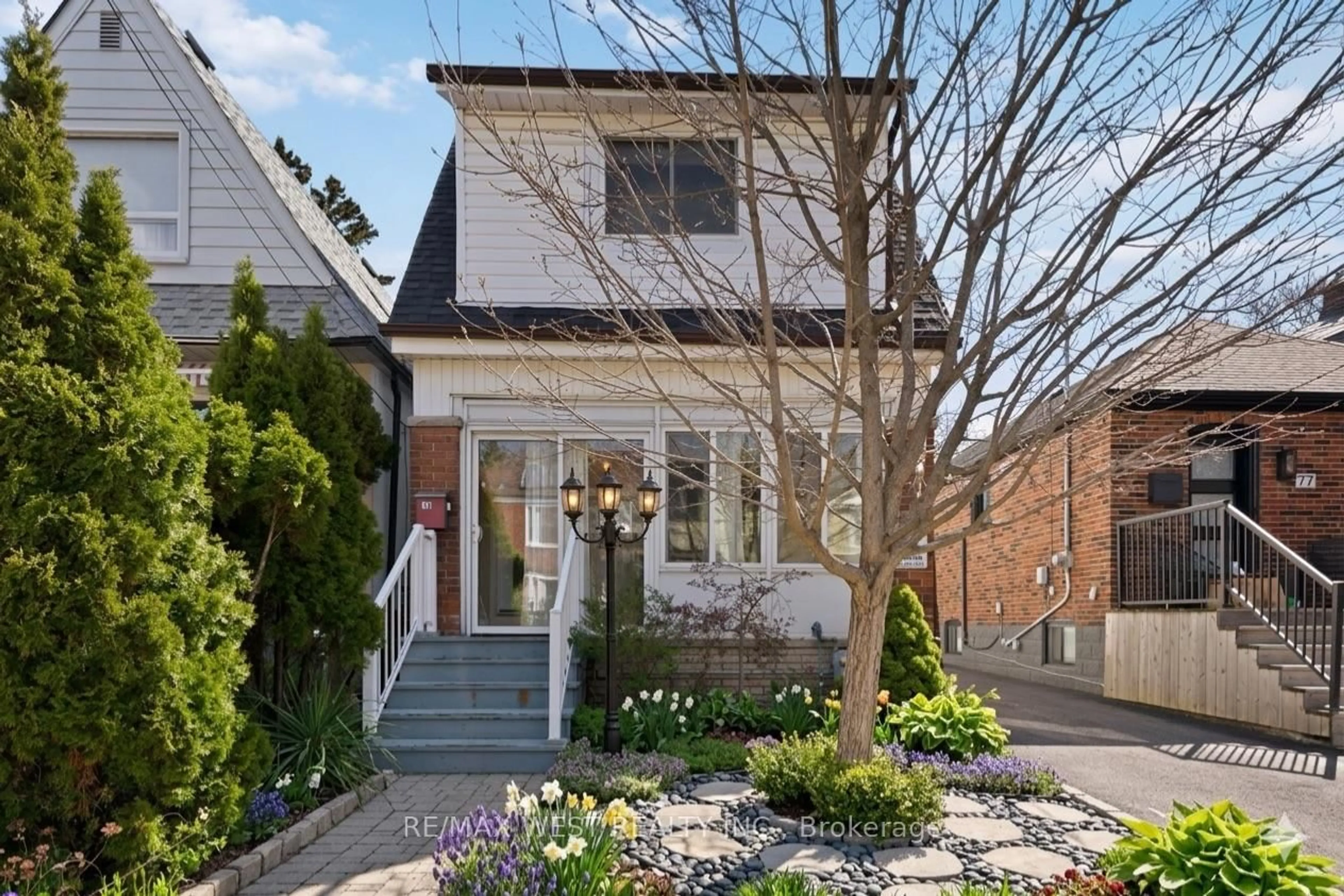 Home with brick exterior material, street for 79 King Edward Ave, Toronto Ontario M4C 5J5