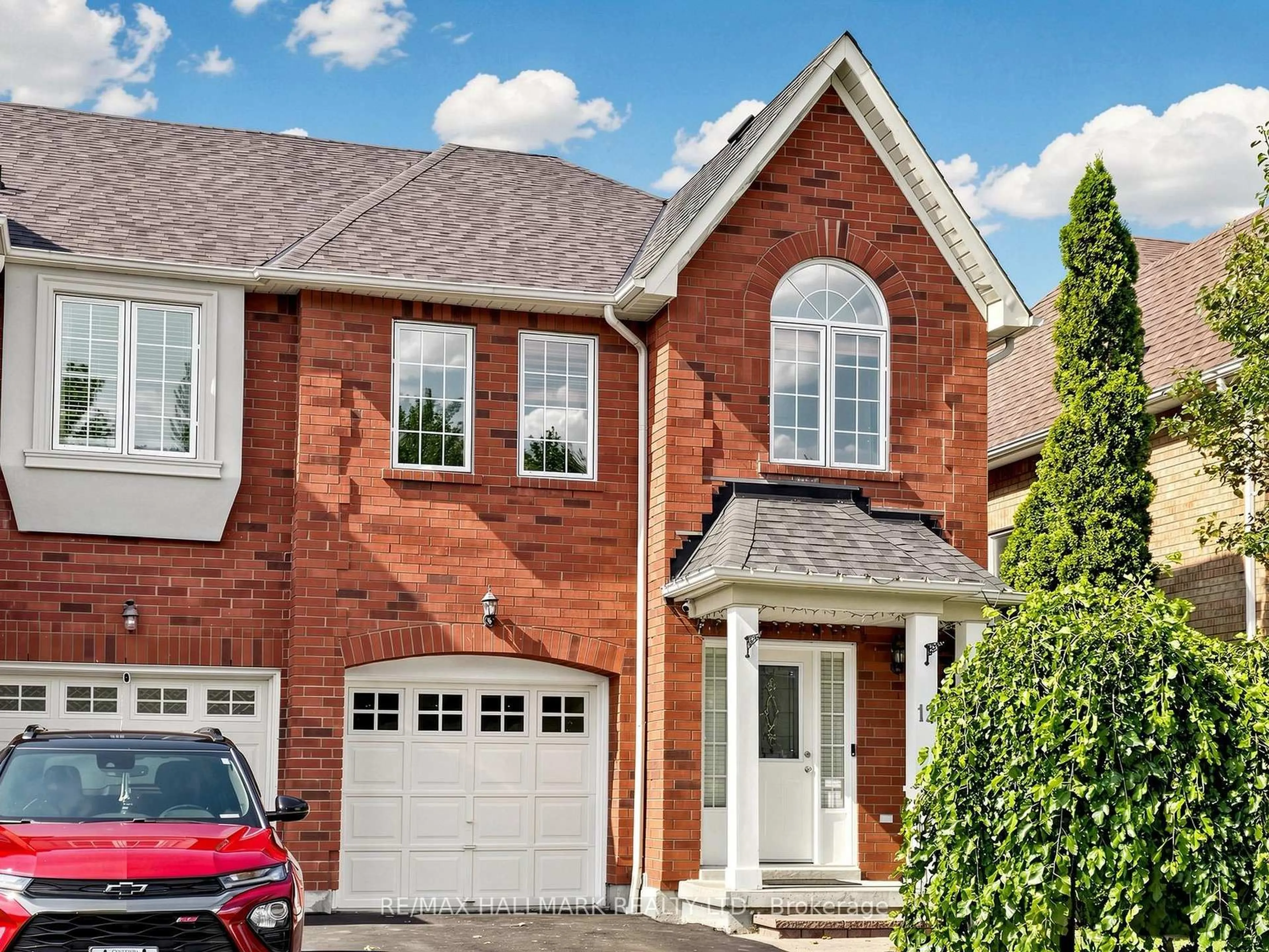 Home with brick exterior material, street for 12 Stokely Cres, Whitby Ontario L1N 9S8