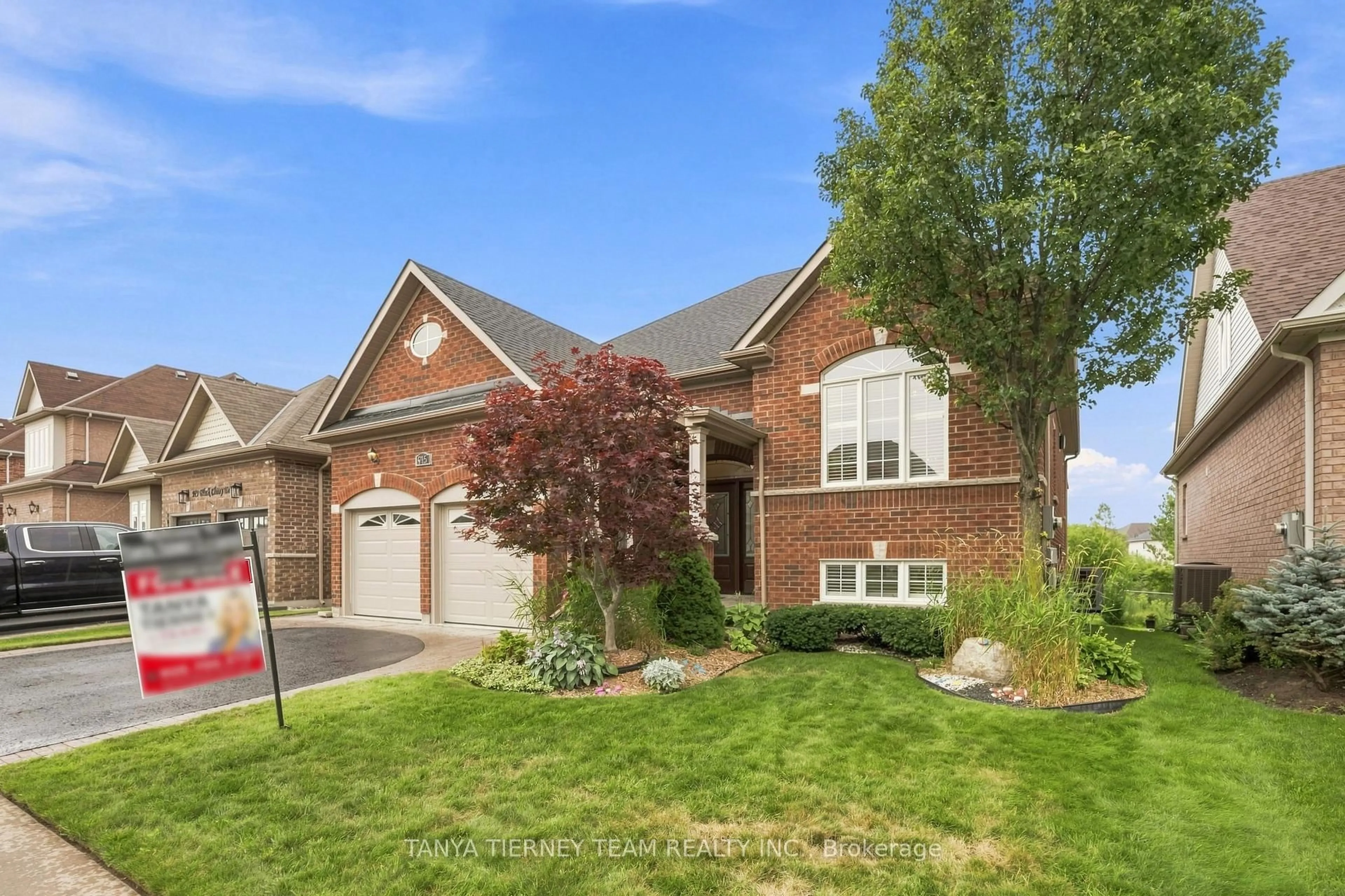 Home with brick exterior material, street for 915 Black Cherry Dr, Oshawa Ontario L1K 0P6