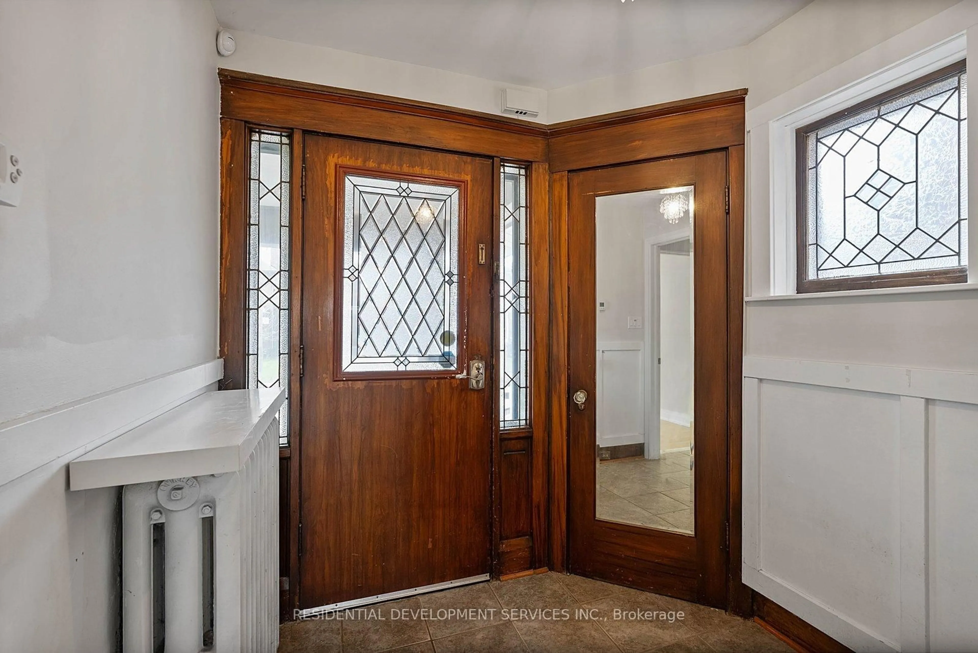 Indoor entryway for 363 Strathmore Blvd, Toronto Ontario M4C 1N4