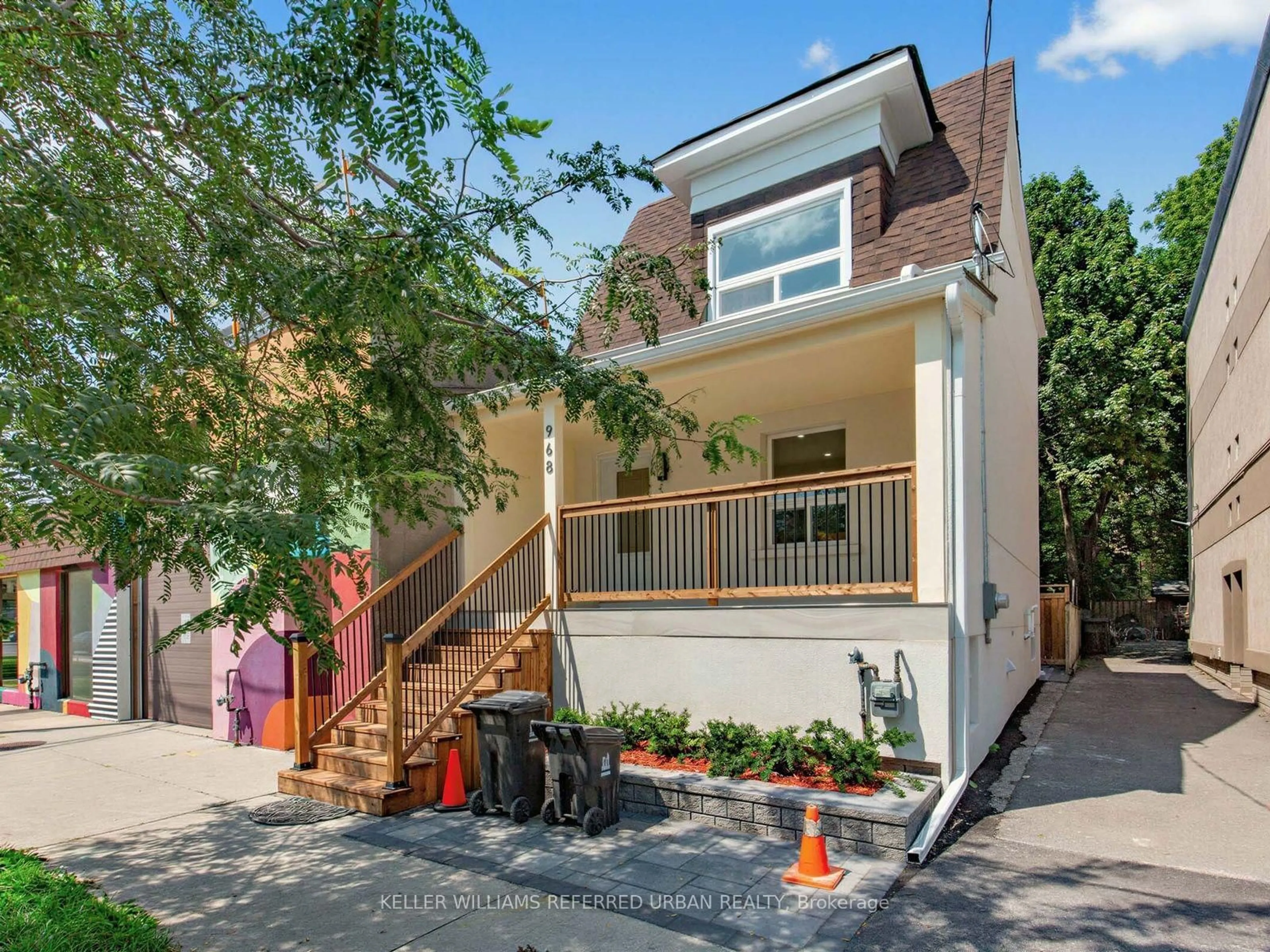 Home with brick exterior material, street for 968 Eastern Ave, Toronto Ontario M4L 1A6