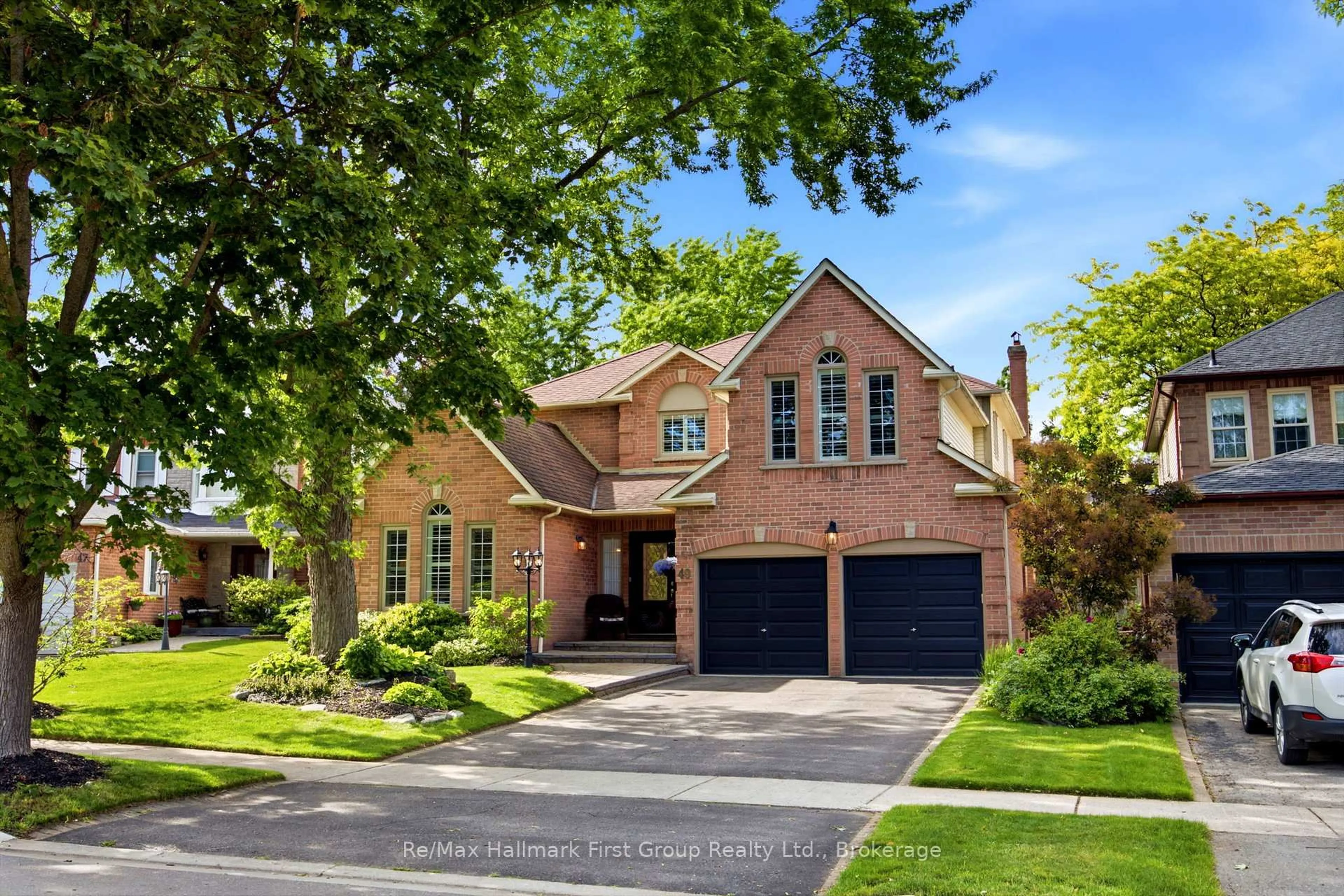 Home with brick exterior material, street for 49 Rothean Dr, Whitby Ontario L1P 1L5