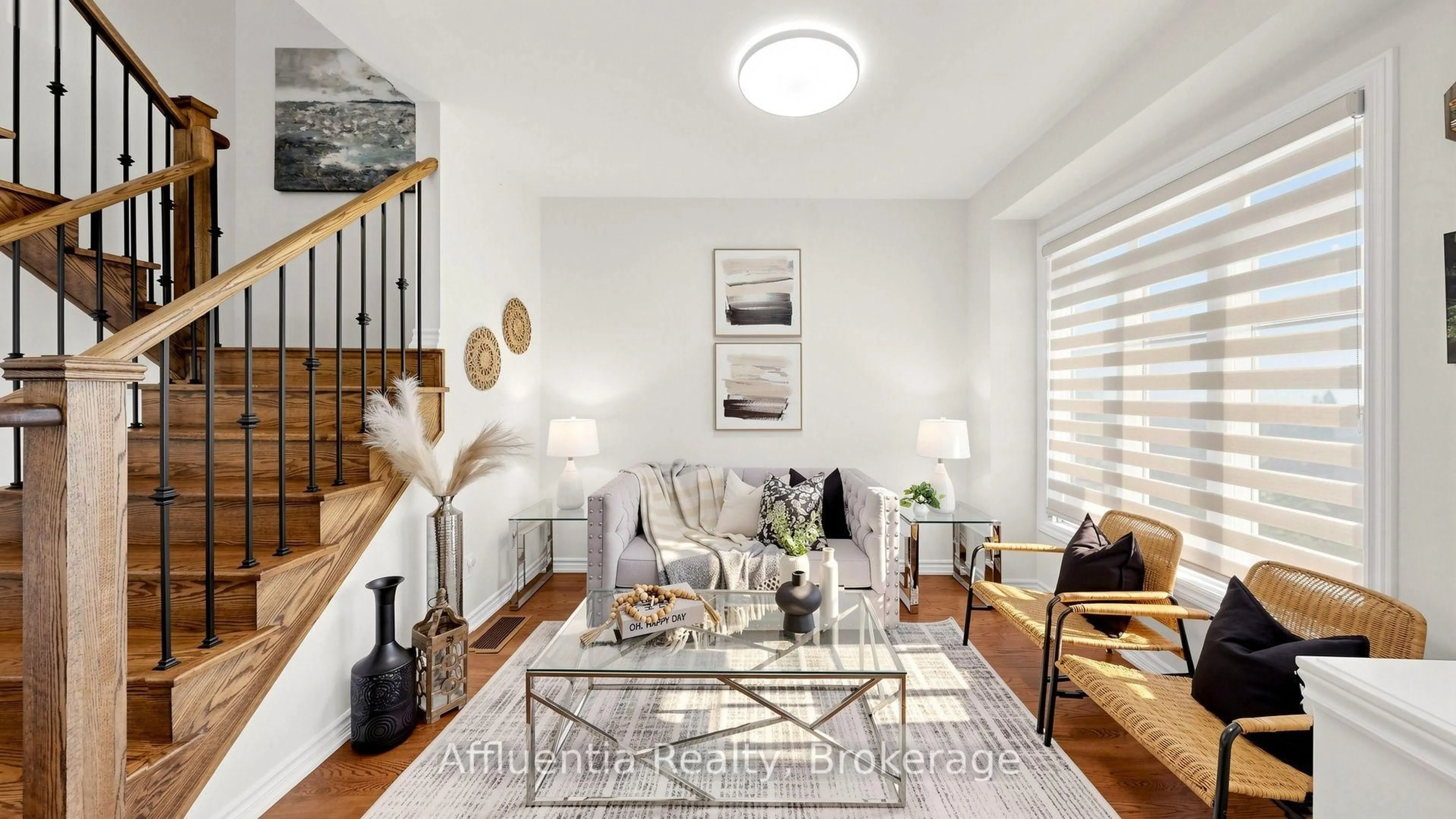 Living room with furniture, wood/laminate floor for 61 Hickling Lane, Ajax Ontario L1T 4R1