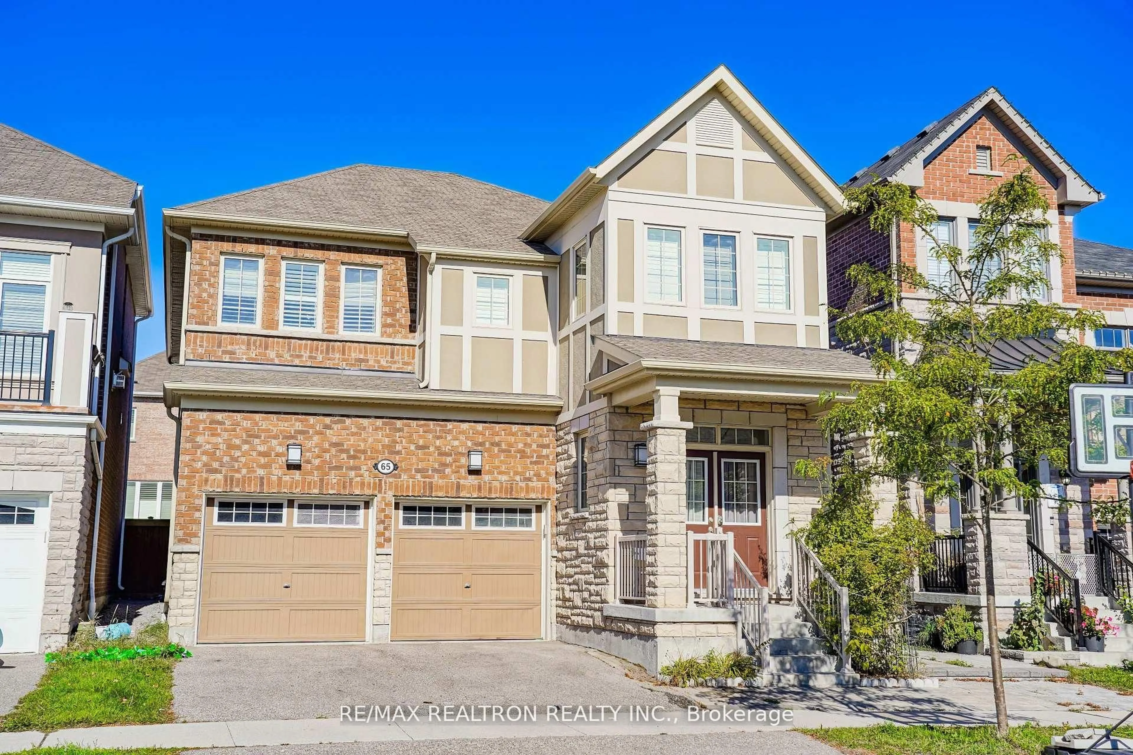 Home with brick exterior material, street for 65 Westfield Dr, Whitby Ontario L1P 0E9