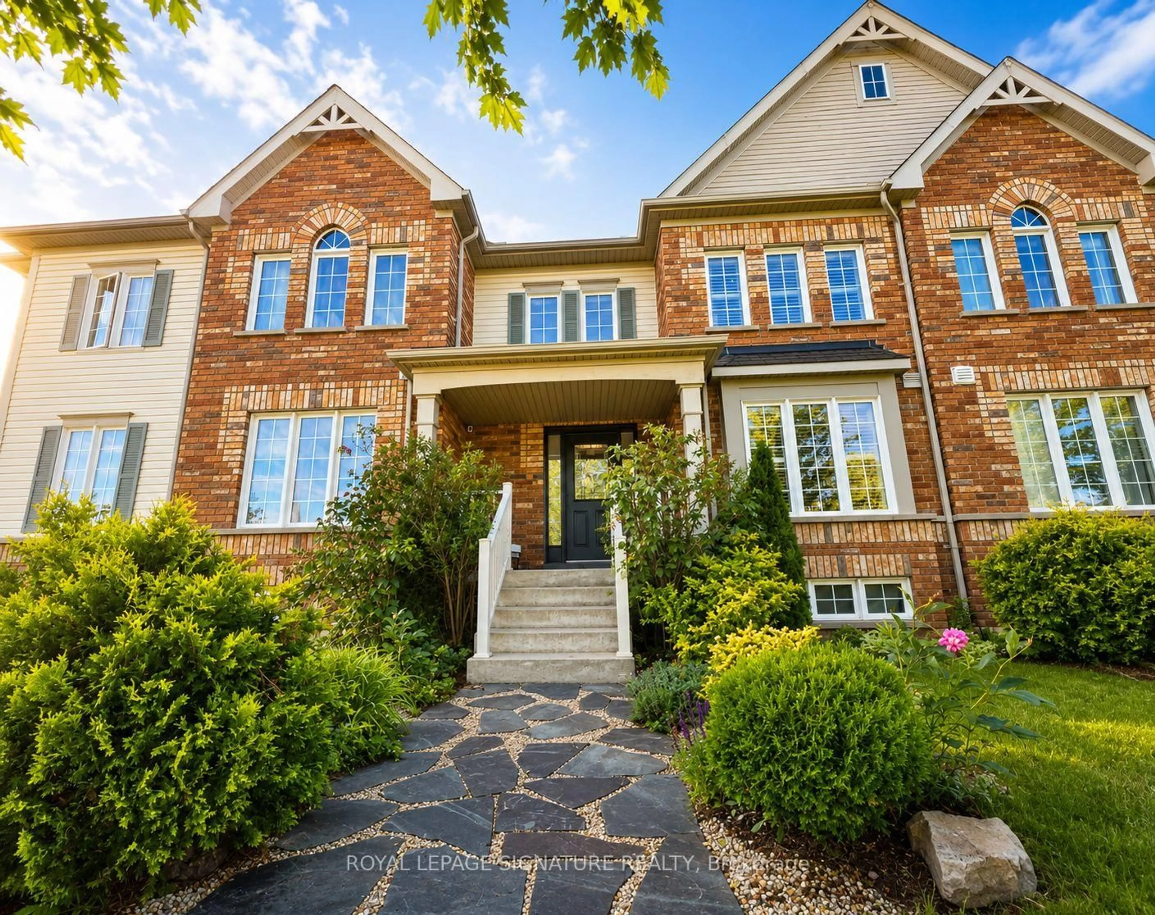 Home with brick exterior material, street for 12 Blytheway Gate, Ajax Ontario L1T 0J5