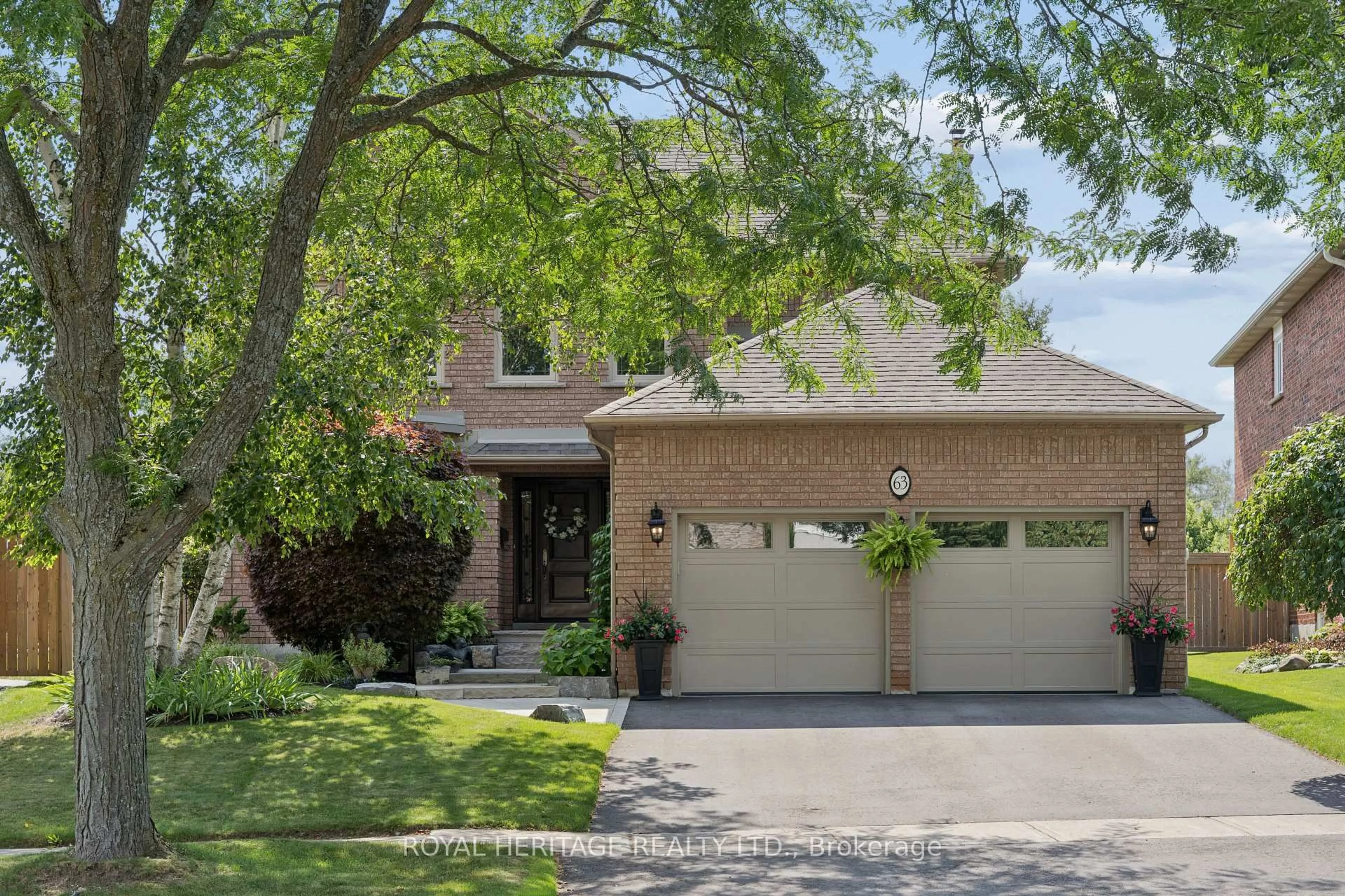 Home with brick exterior material, street for 63 Kennett Dr, Whitby Ontario L1P 1L5