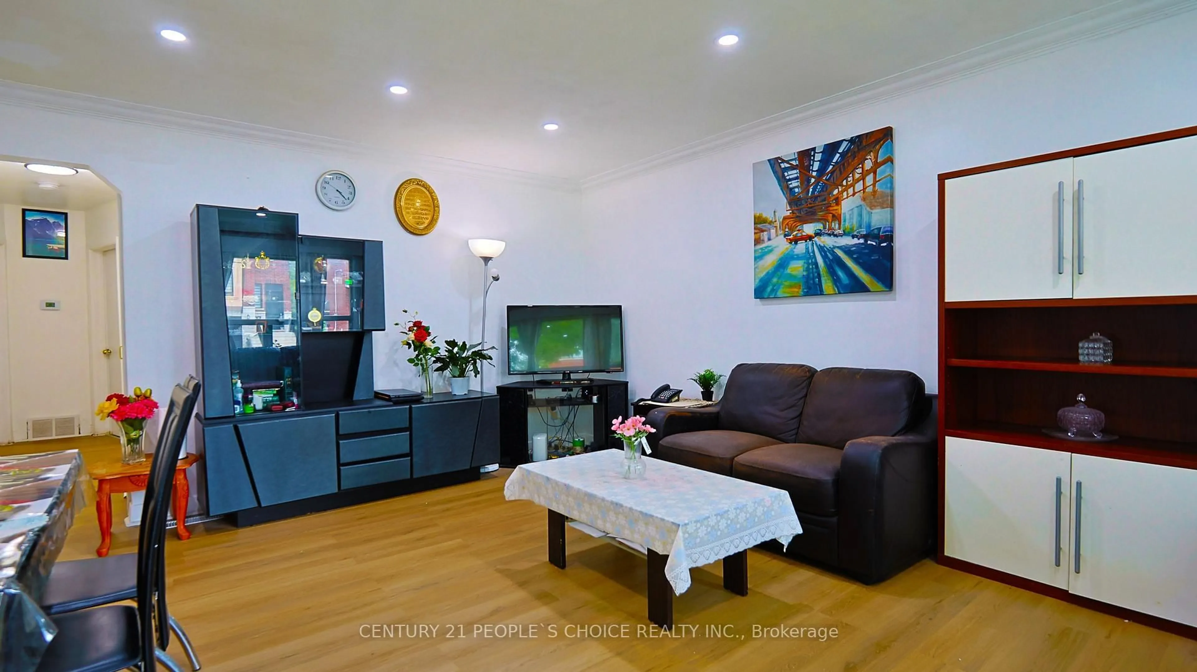 Living room with furniture, wood/laminate floor for 14 North Bonnington Ave, Toronto Ontario M1K 1X2