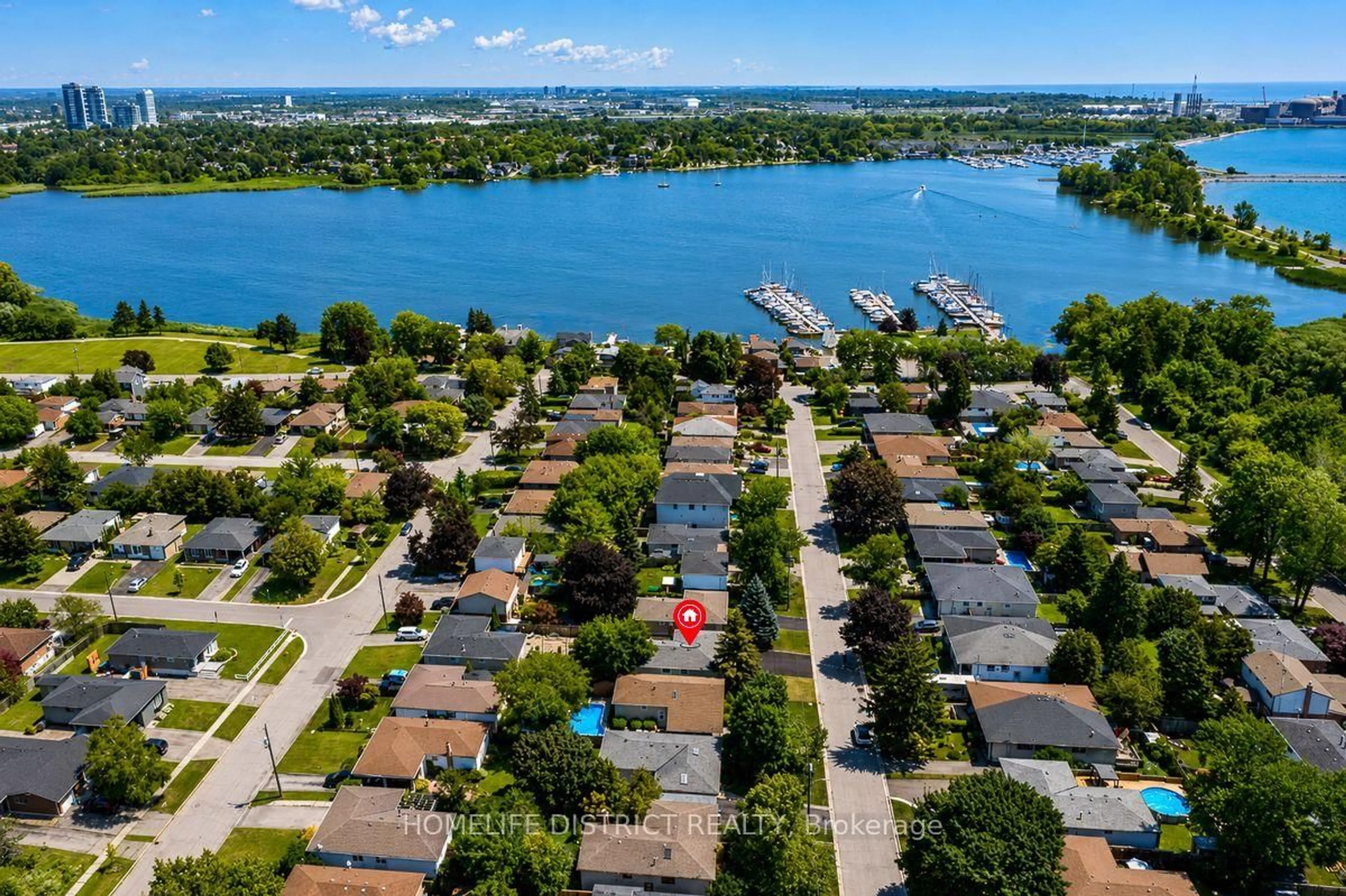 A pic from outside/outdoor area/front of a property/back of a property/a pic from drone, water/lake/river/ocean view for 950 Mink St, Pickering Ontario L1W 2G5