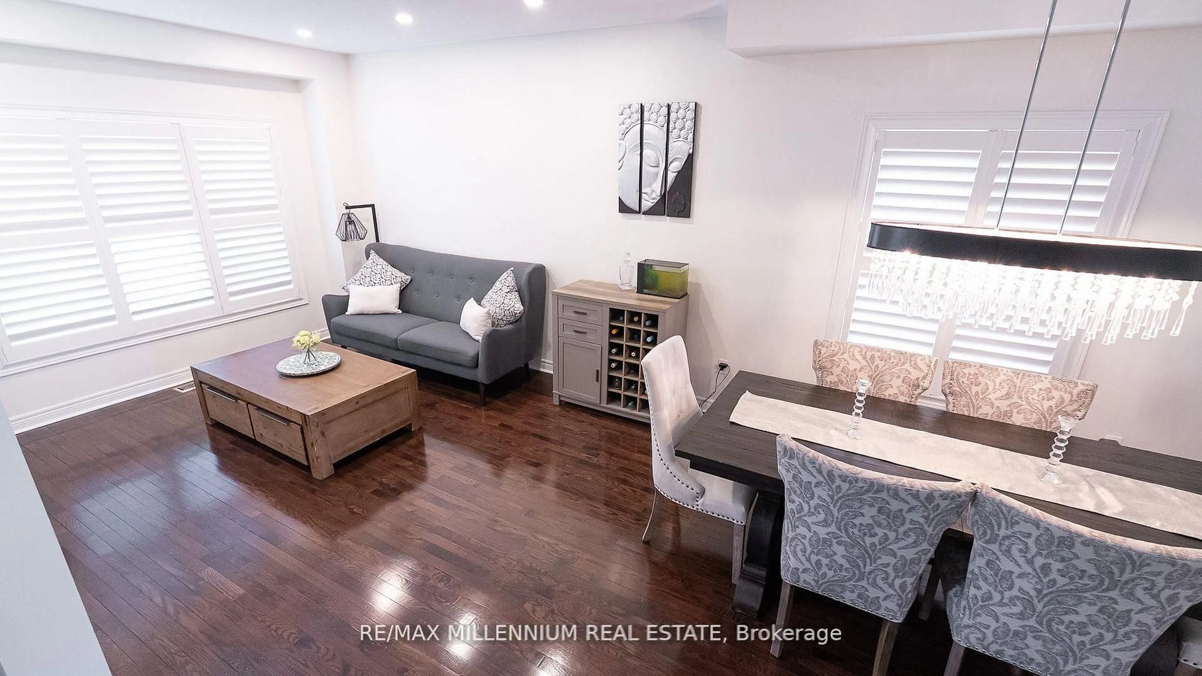 Living room with furniture, wood/laminate floor for 19 Bellotti Cres, Ajax Ontario L1Z 0M2