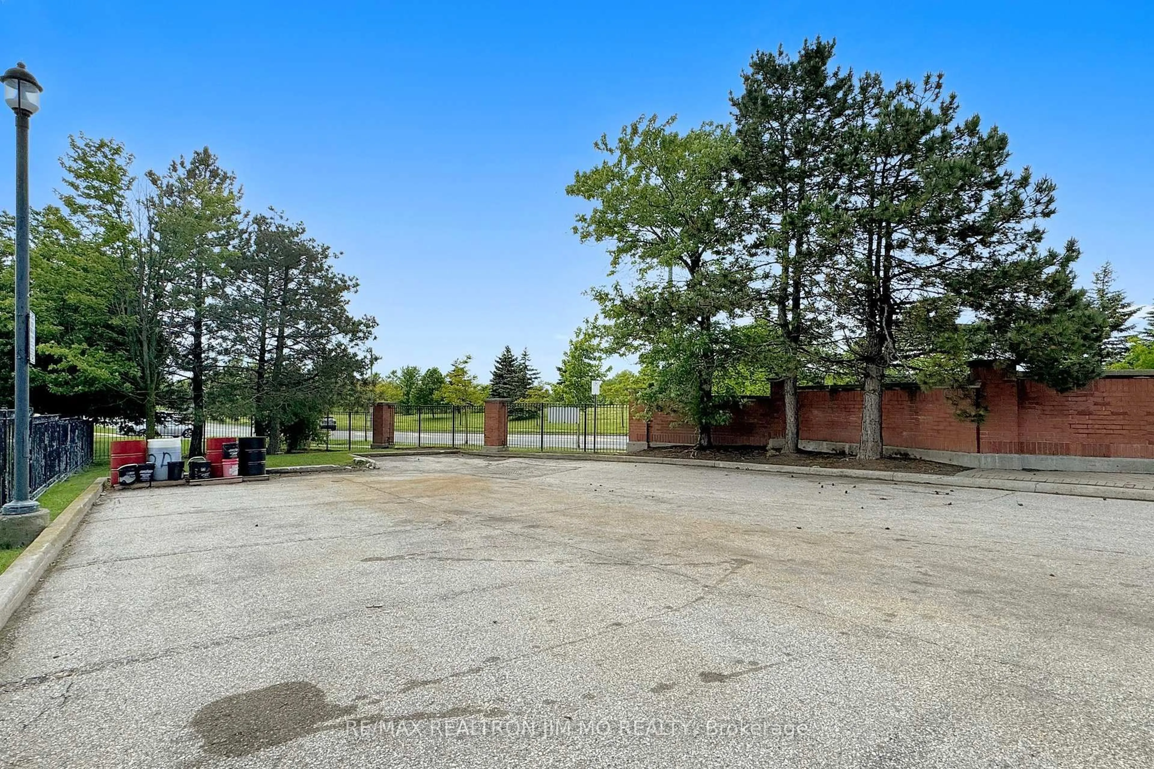A pic from outside/outdoor area/front of a property/back of a property/a pic from drone, unknown for 1881 Mcnicoll Ave #110, Toronto Ontario M1V 5M2