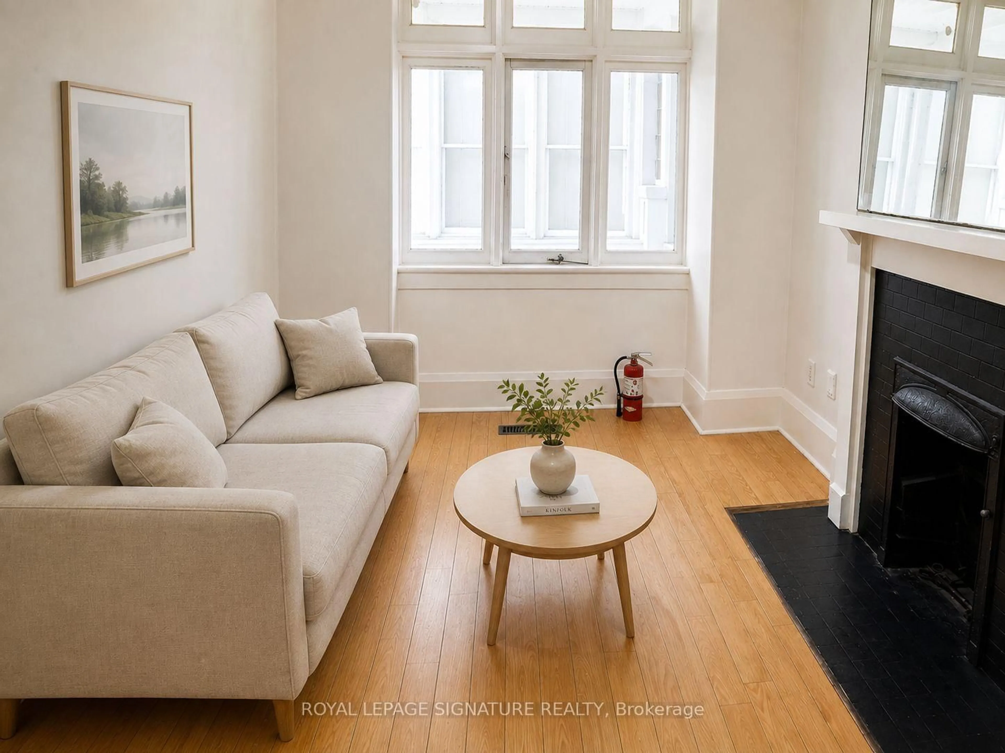 Living room with furniture, wood/laminate floor for 916 Woodbine Ave, Toronto Ontario M4C 4B7