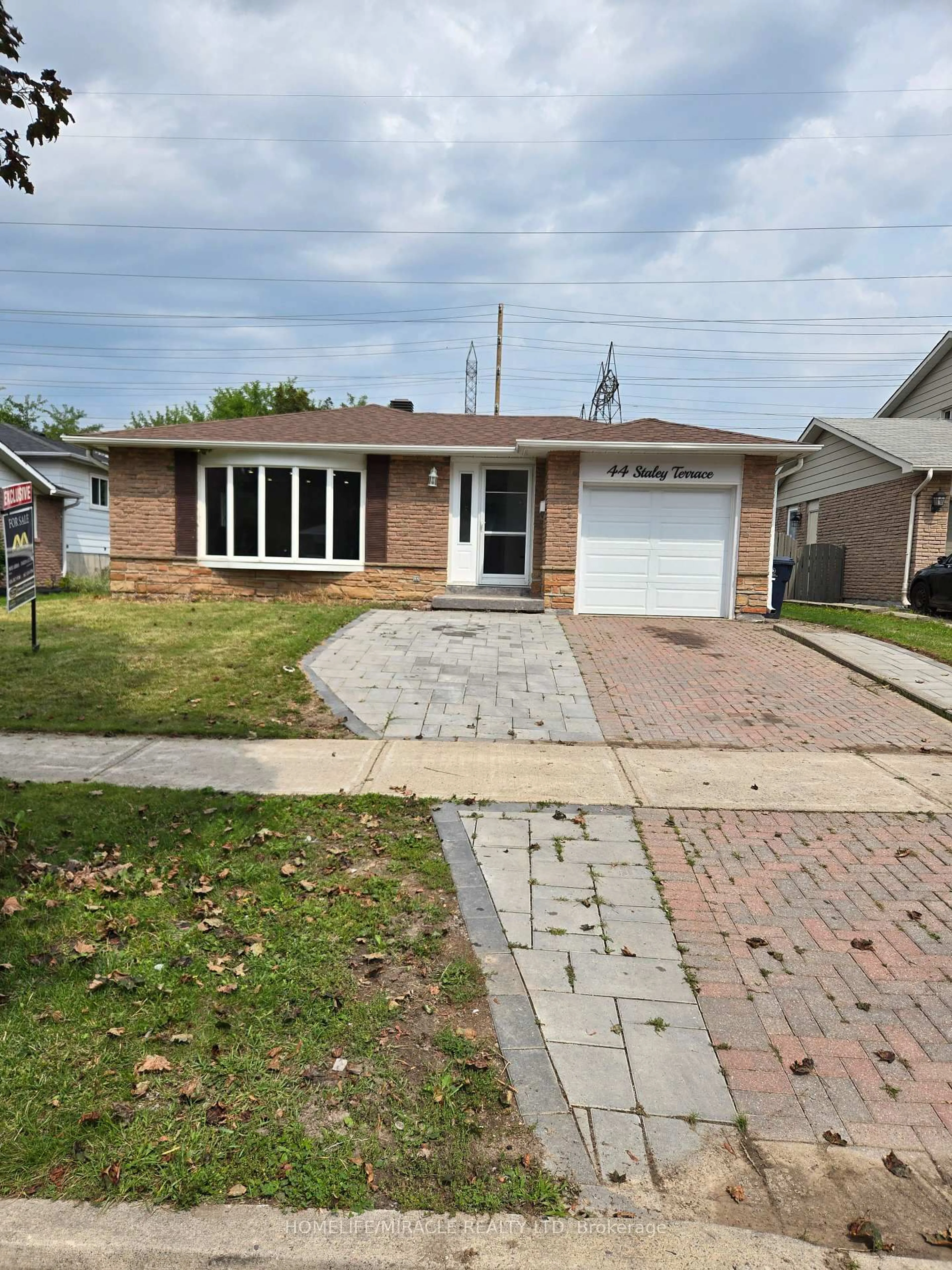 Home with brick exterior material, street for 44 Staley Terr, Toronto Ontario M1W 2E7