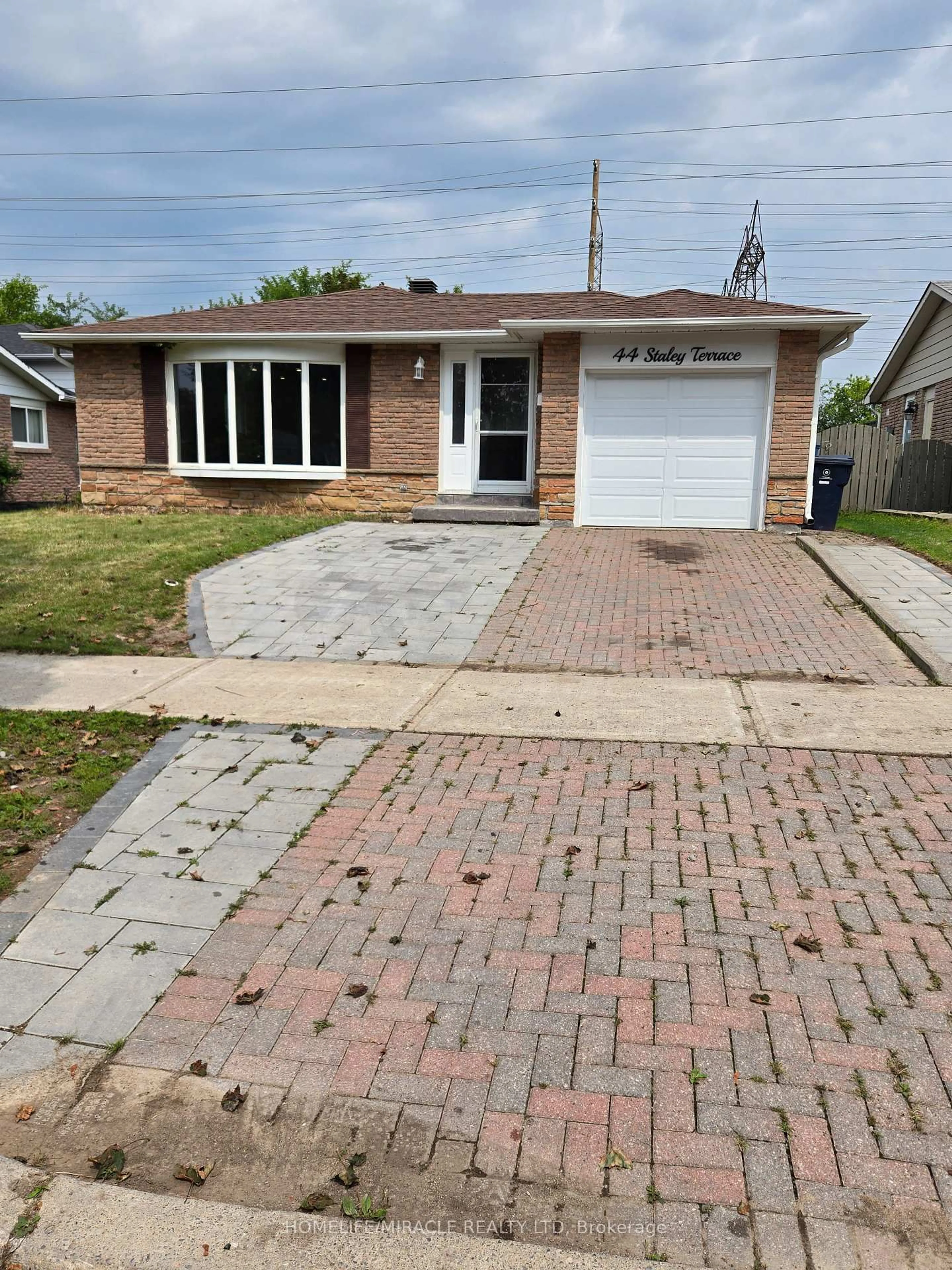 Home with brick exterior material, street for 44 Staley Terr, Toronto Ontario M1W 2E7