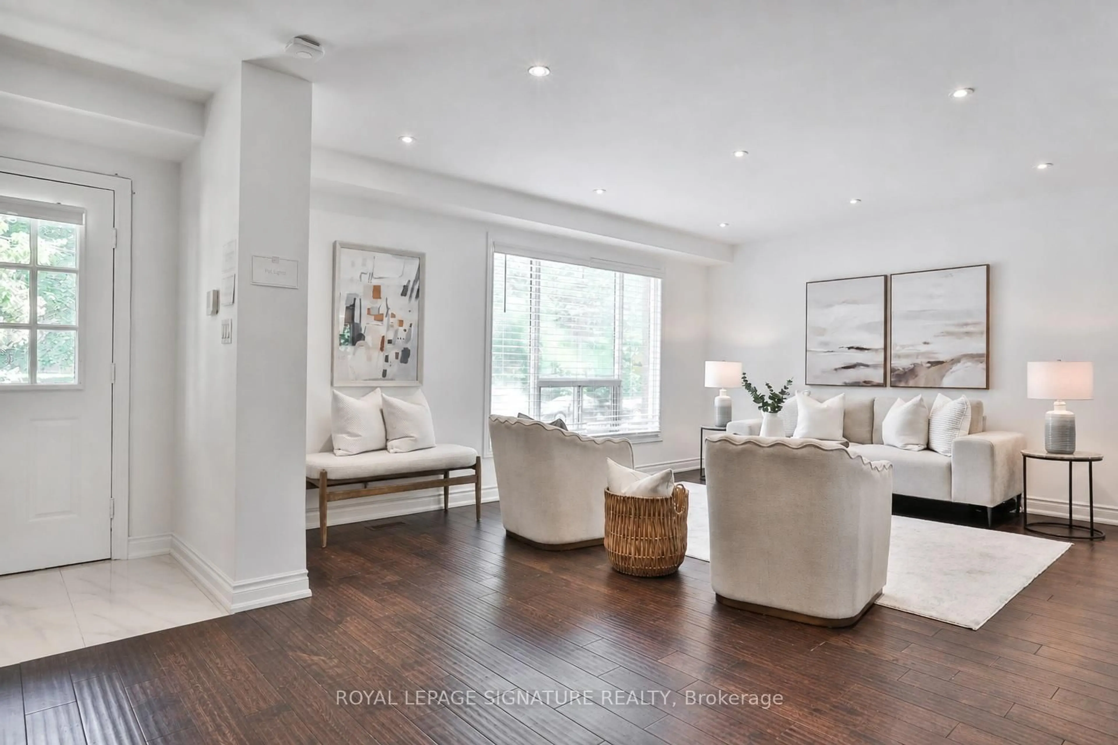 Living room with furniture, wood/laminate floor for 280 Gowan Ave, Toronto Ontario M4J 2K6