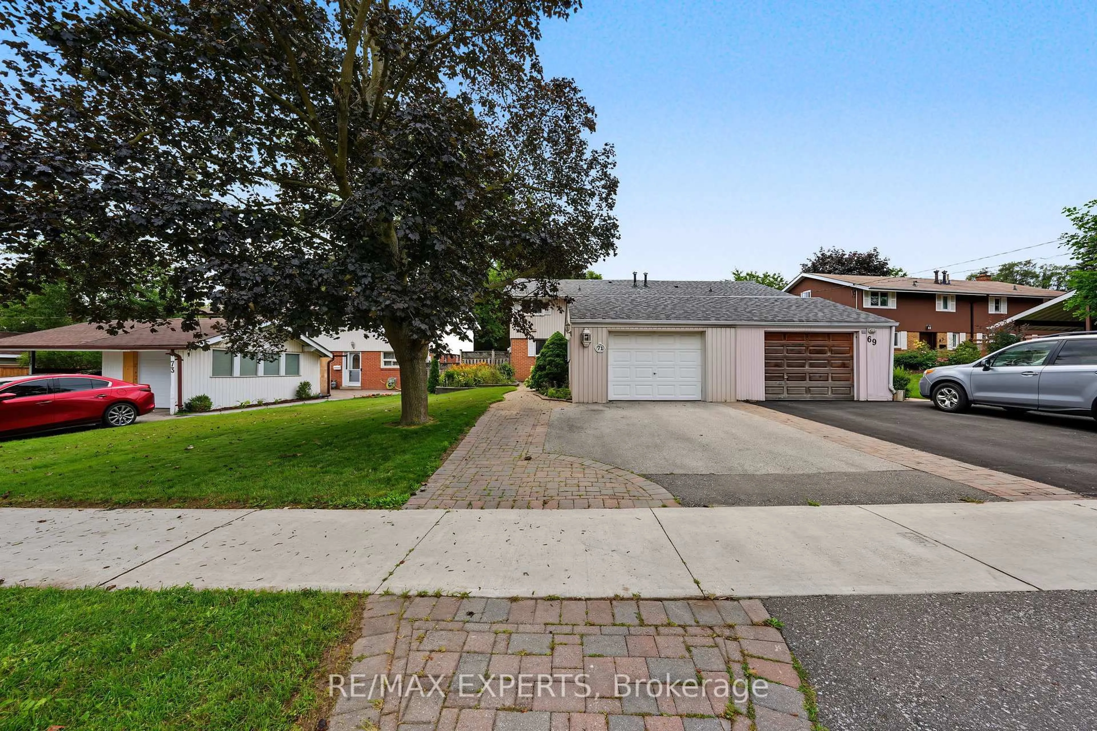 A pic from outside/outdoor area/front of a property/back of a property/a pic from drone, street for 71 Dogwood Cres, Toronto Ontario M1P 3N5