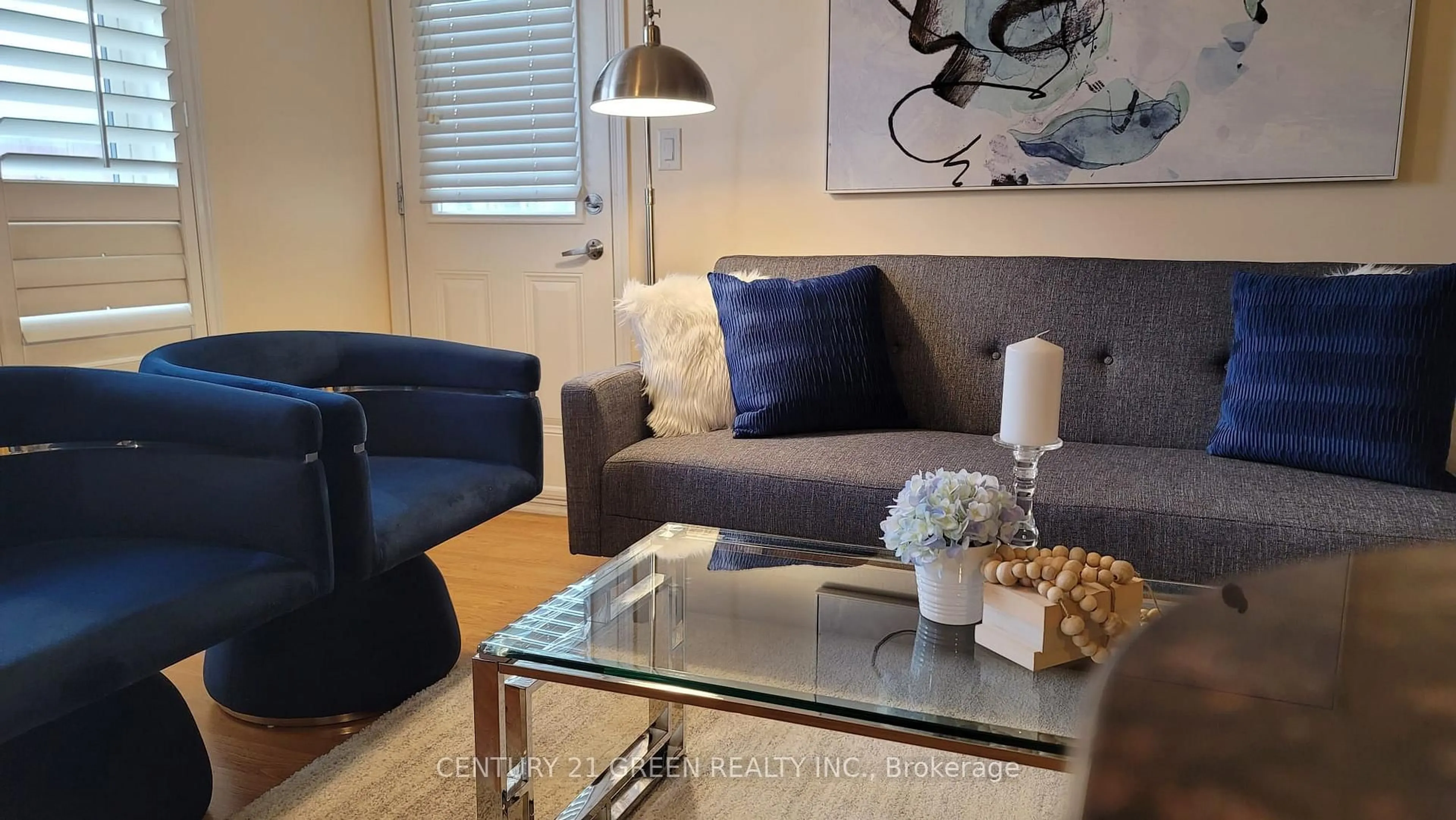Living room with furniture, wood/laminate floor for 10 Mendelssohn St #409, Toronto Ontario M1L 0G7
