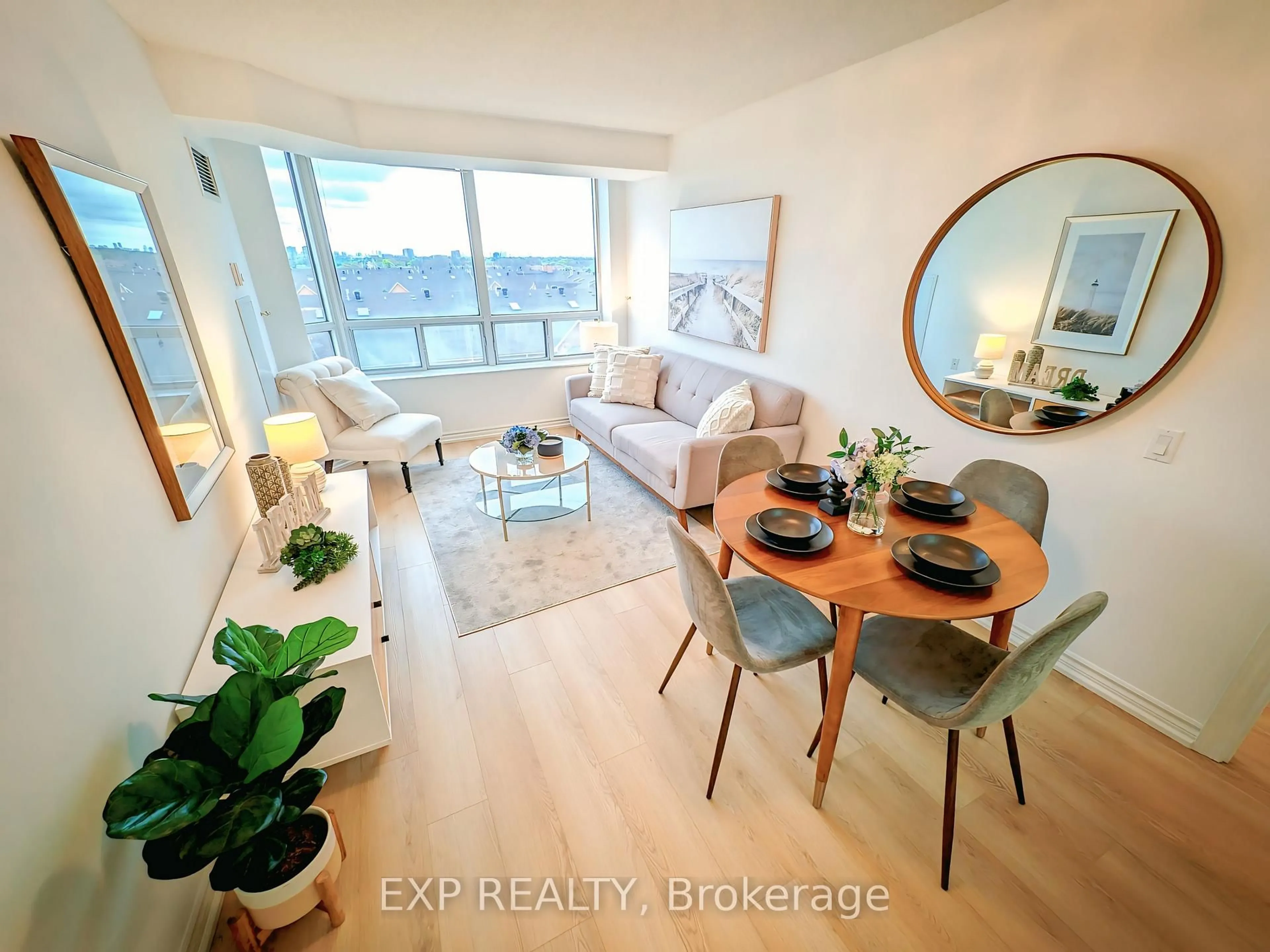 Living room with furniture, wood/laminate floor for 3088 Kennedy Rd #712, Toronto Ontario M1V 5M4