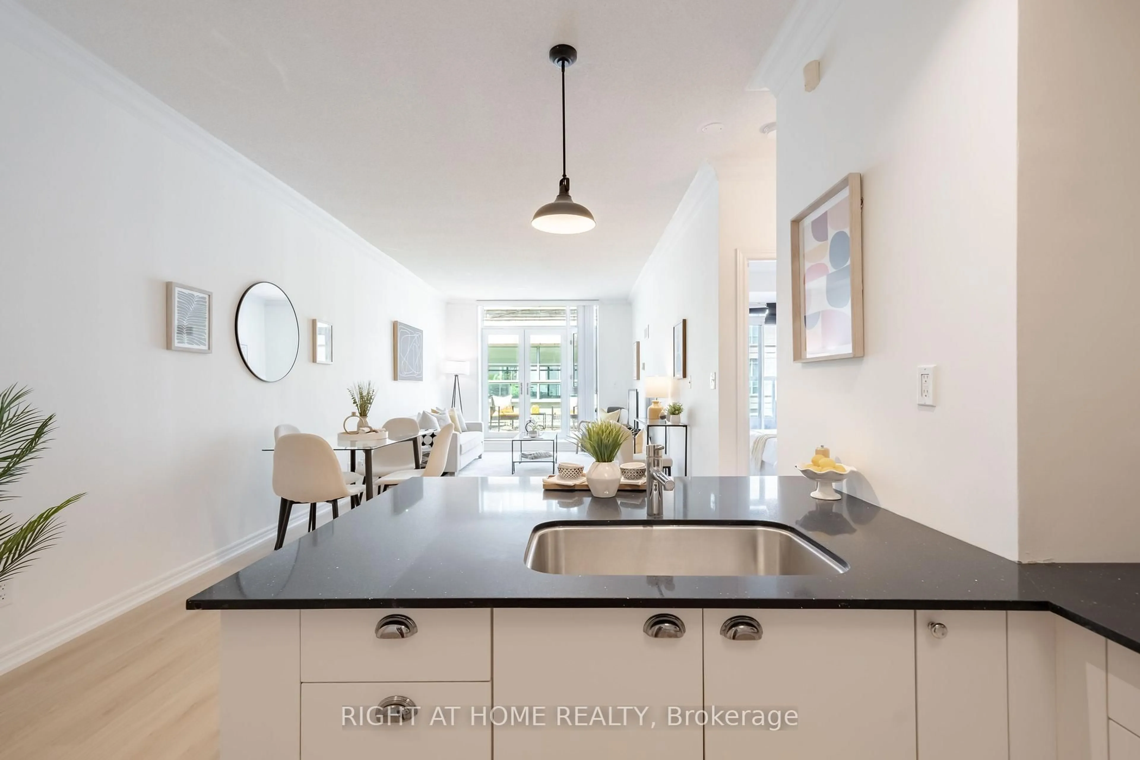 Open concept kitchen, ceramic/tile floor for 35 Boardwalk Dr #202, Toronto Ontario M4L 3Y8