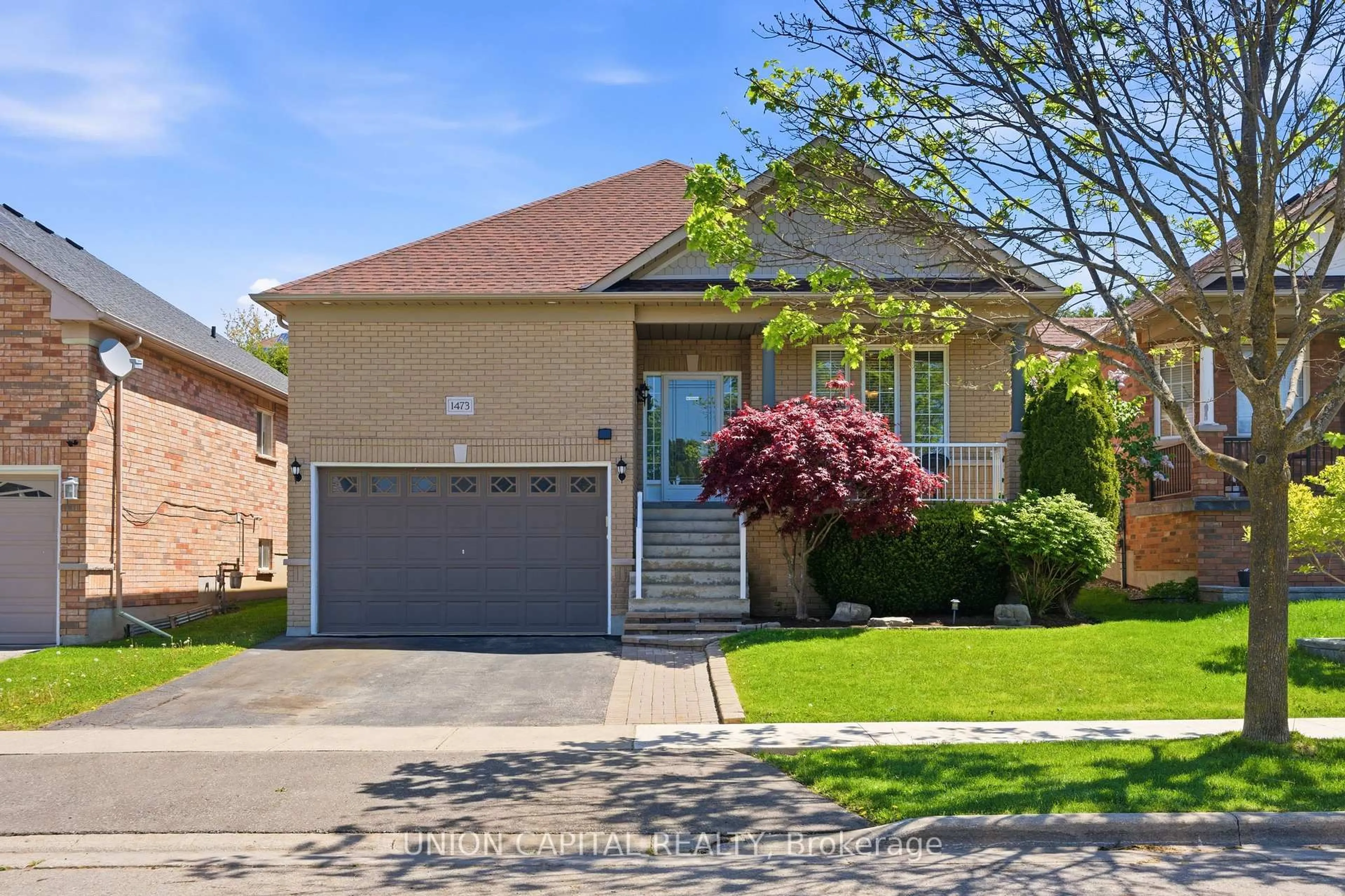 Home with brick exterior material, street for 1473 Greenvalley Tr, Oshawa Ontario L1K 2N5