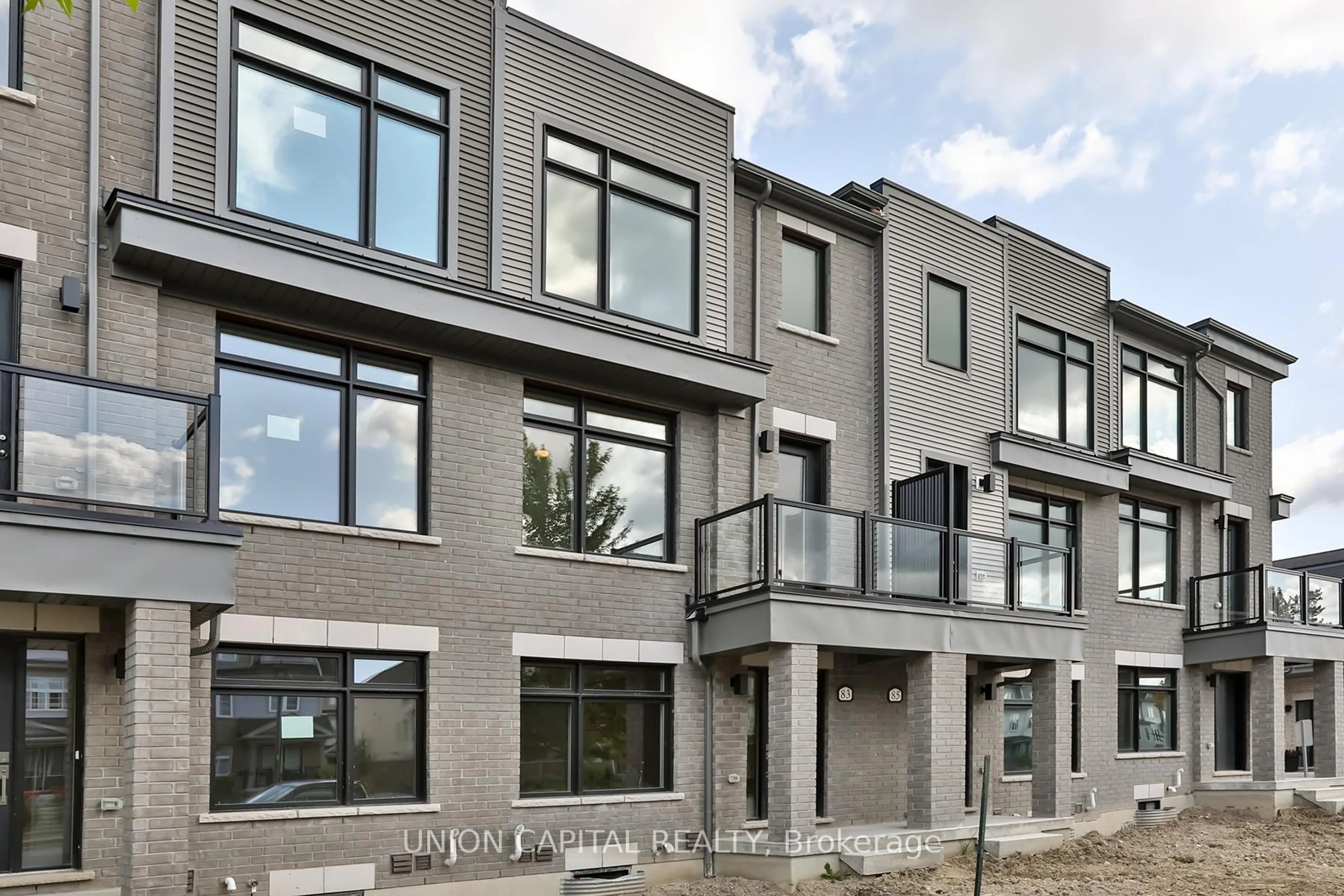 Home with brick exterior material, street for 83 Sorbara Way, Whitby Ontario L1M 2L1