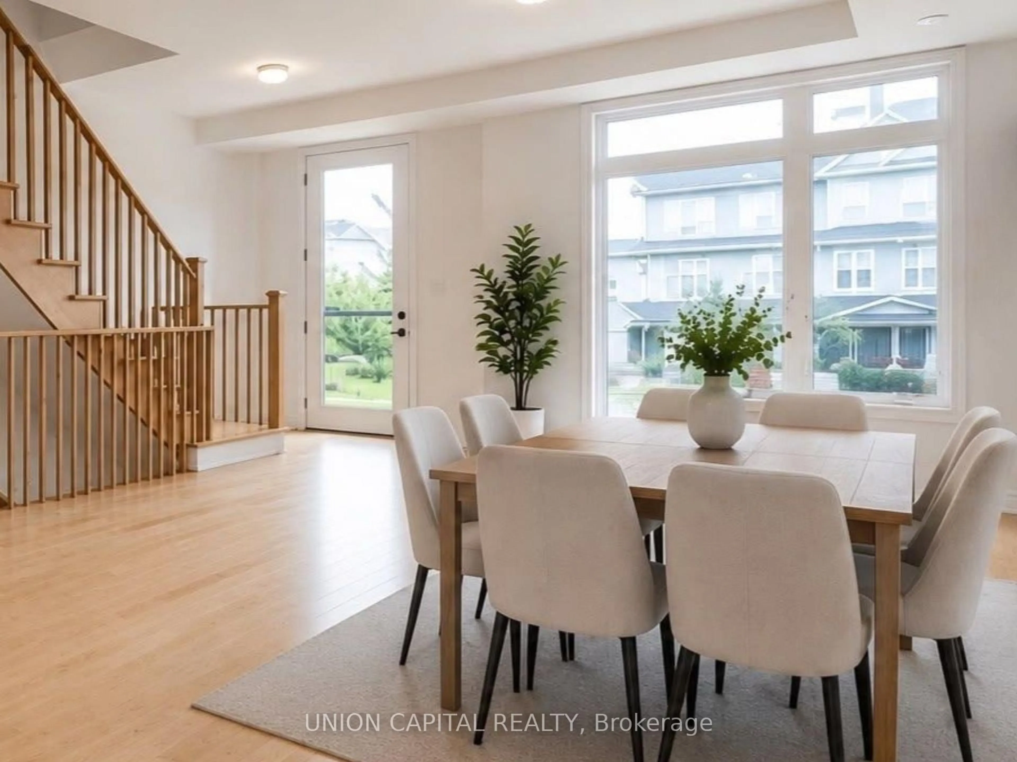 Dining room, wood/laminate floor for 83 Sorbara Way, Whitby Ontario L1M 2L1