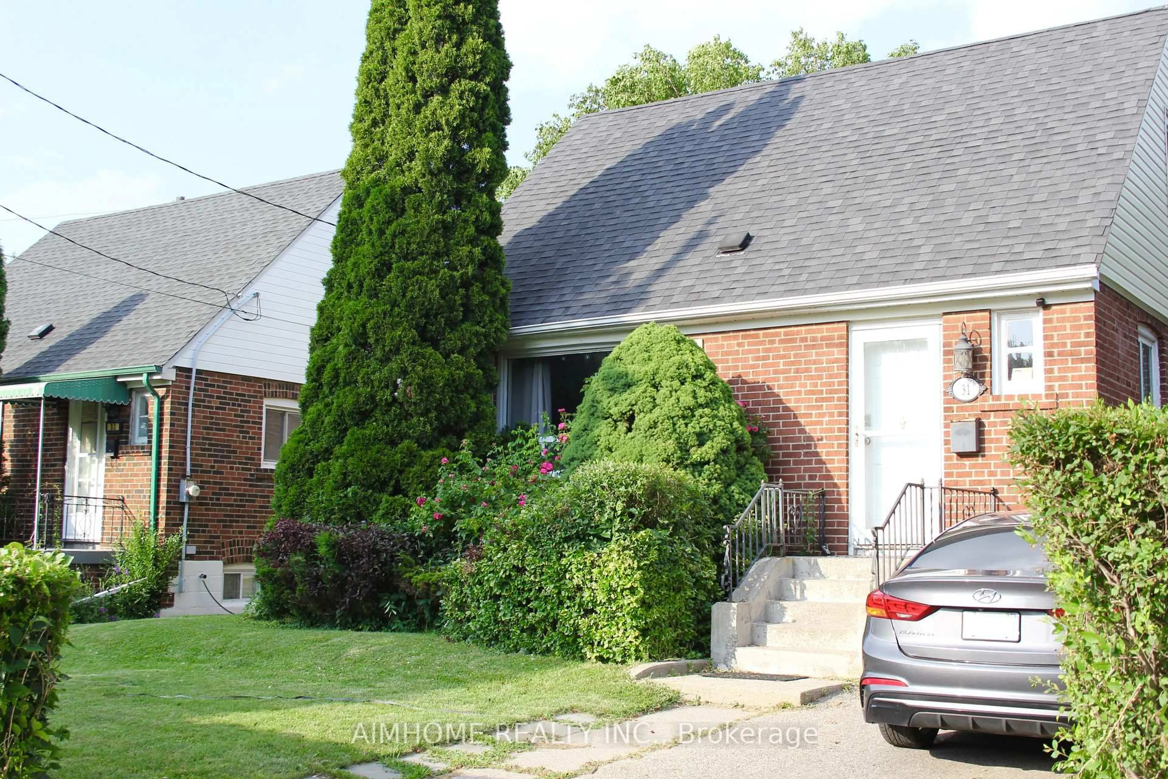 Home with brick exterior material, street for 31 Camilla Cres, Toronto Ontario M1L 1Y9