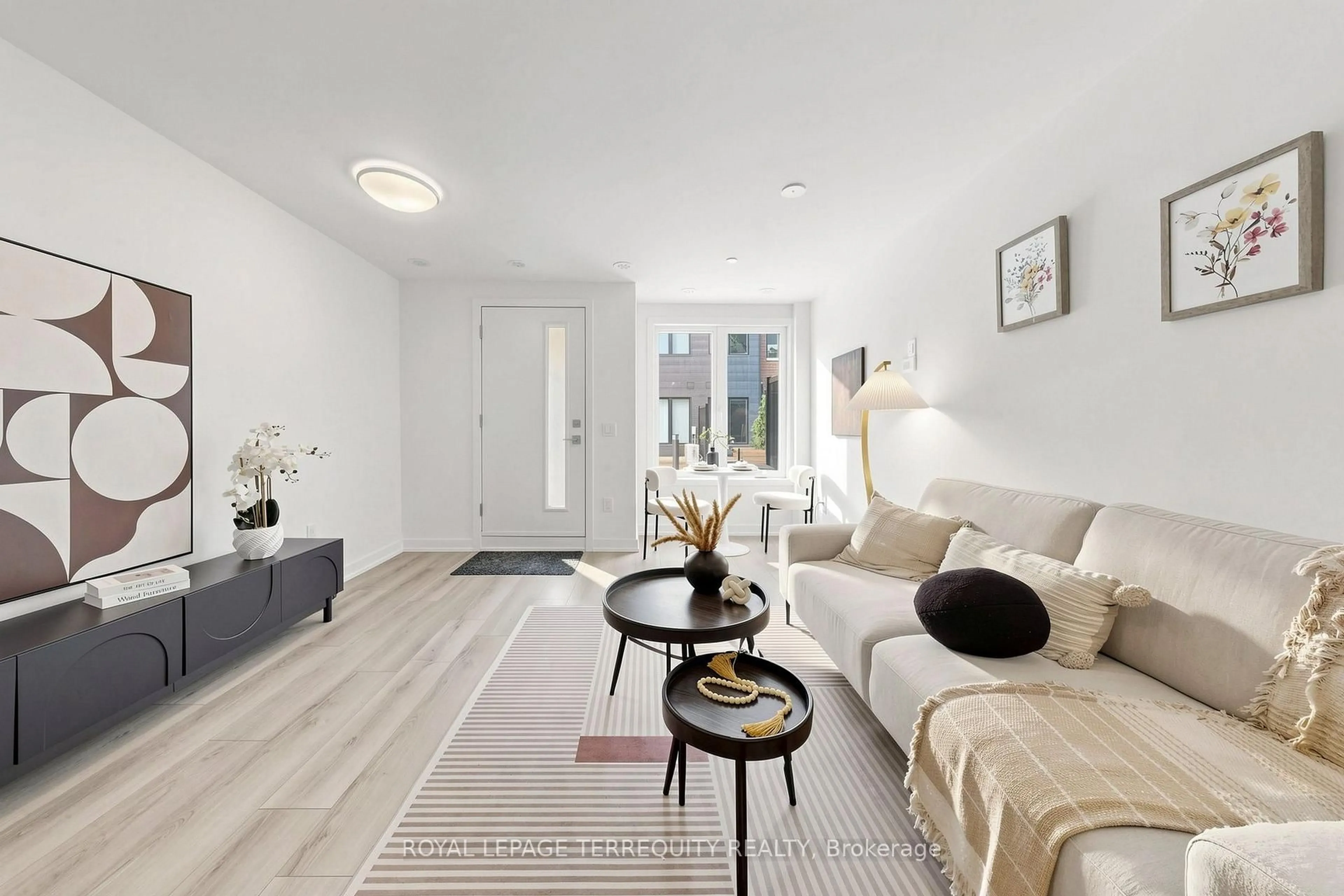 Living room with furniture, unknown for 10 Calamint Lane #66, Toronto Ontario M1W 2H1