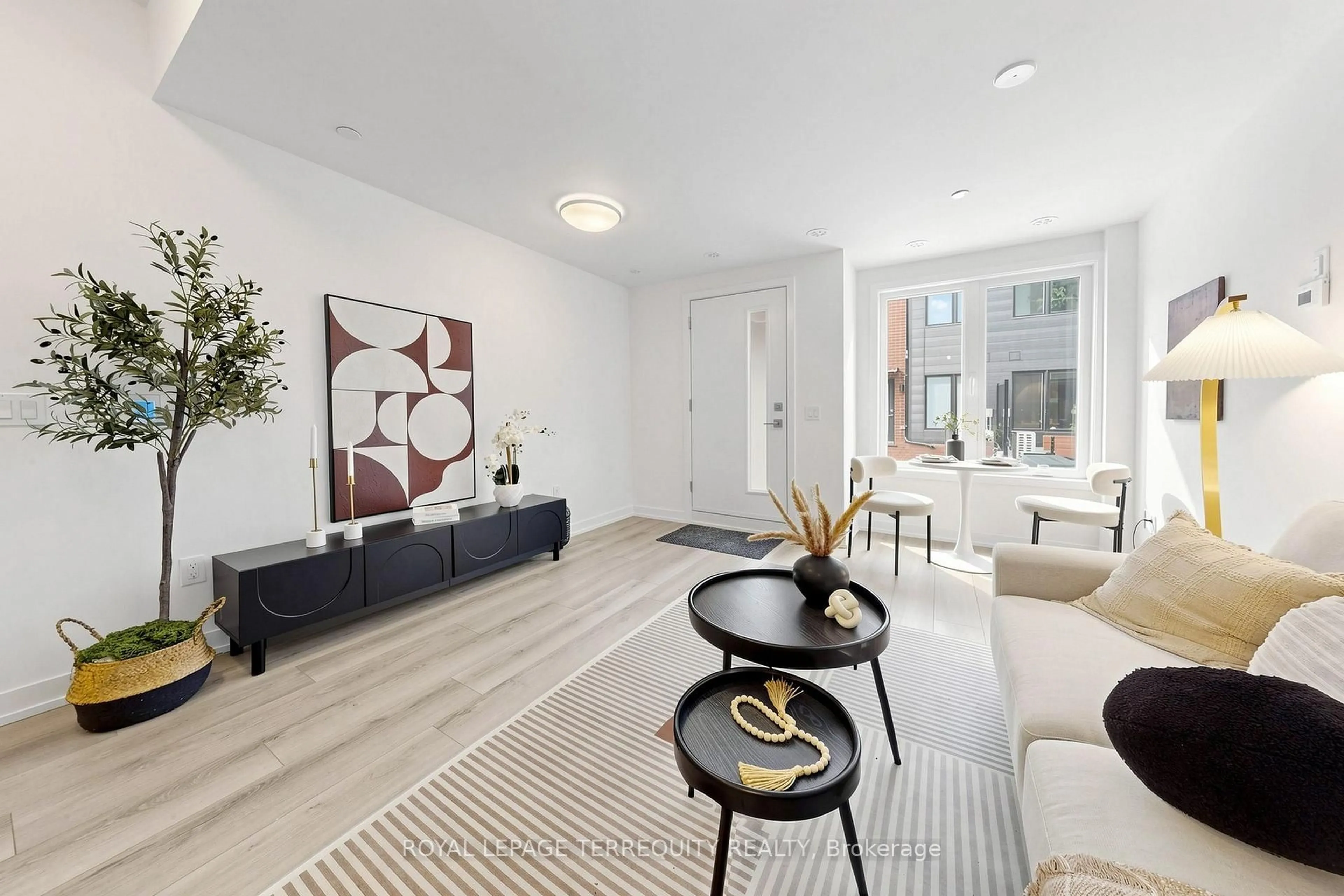 Living room with furniture, unknown for 10 Calamint Lane #66, Toronto Ontario M1W 2H1