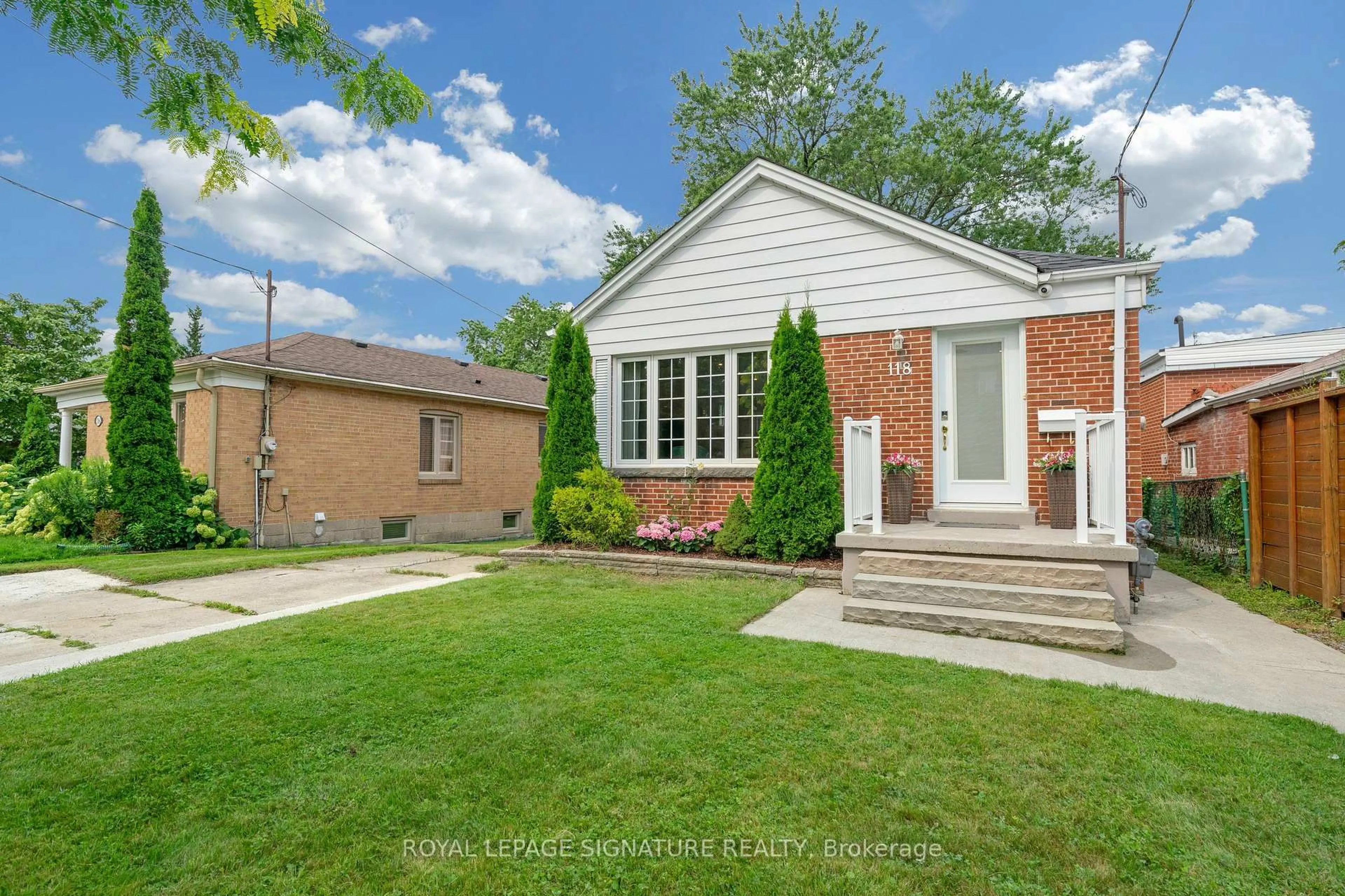 Home with brick exterior material, street for 118 Rexleigh Dr, Toronto Ontario M4B 2N3