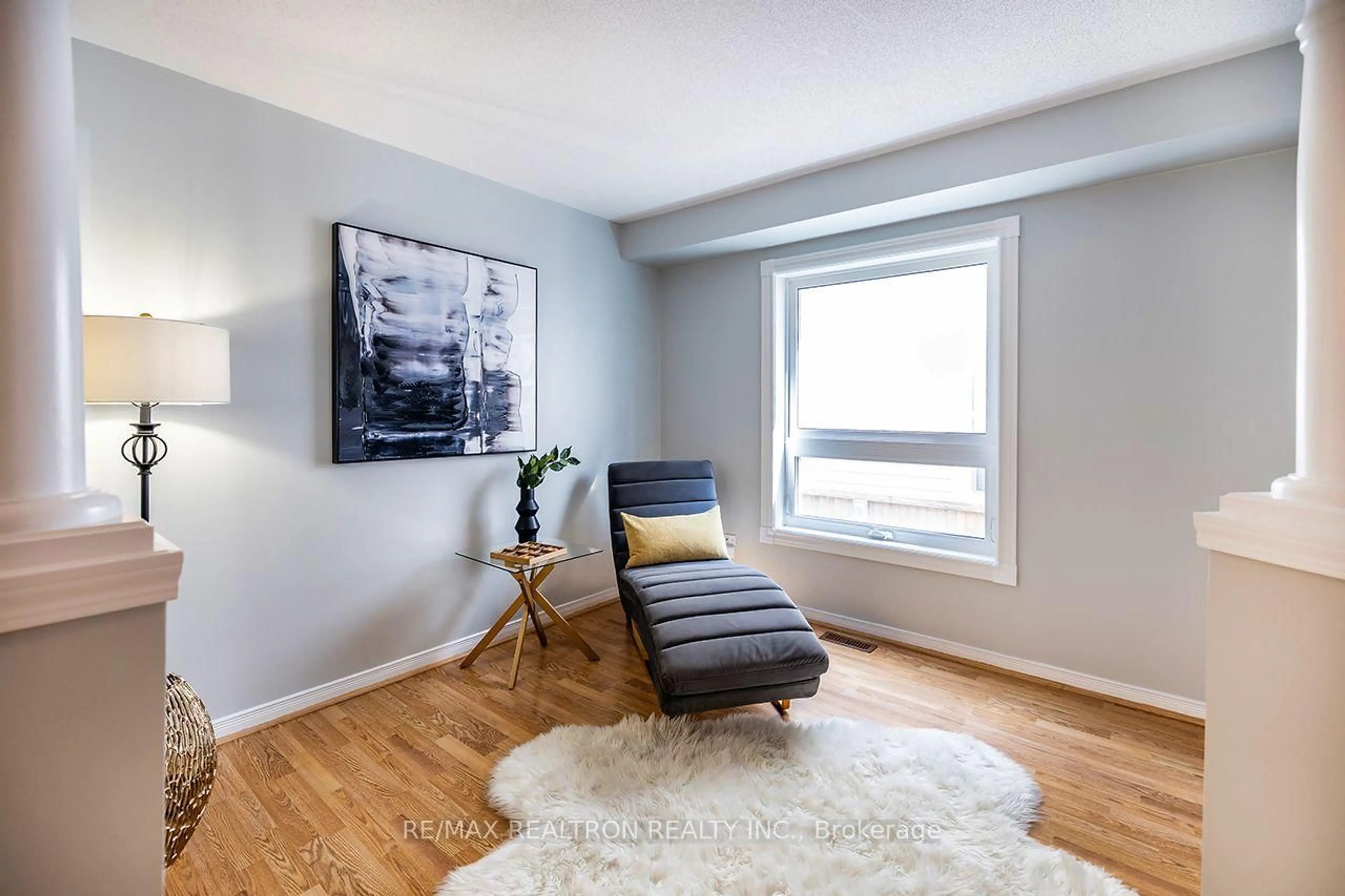 Living room with furniture, wood/laminate floor for 82 Beachgrove Cres, Whitby Ontario L1R 3G3