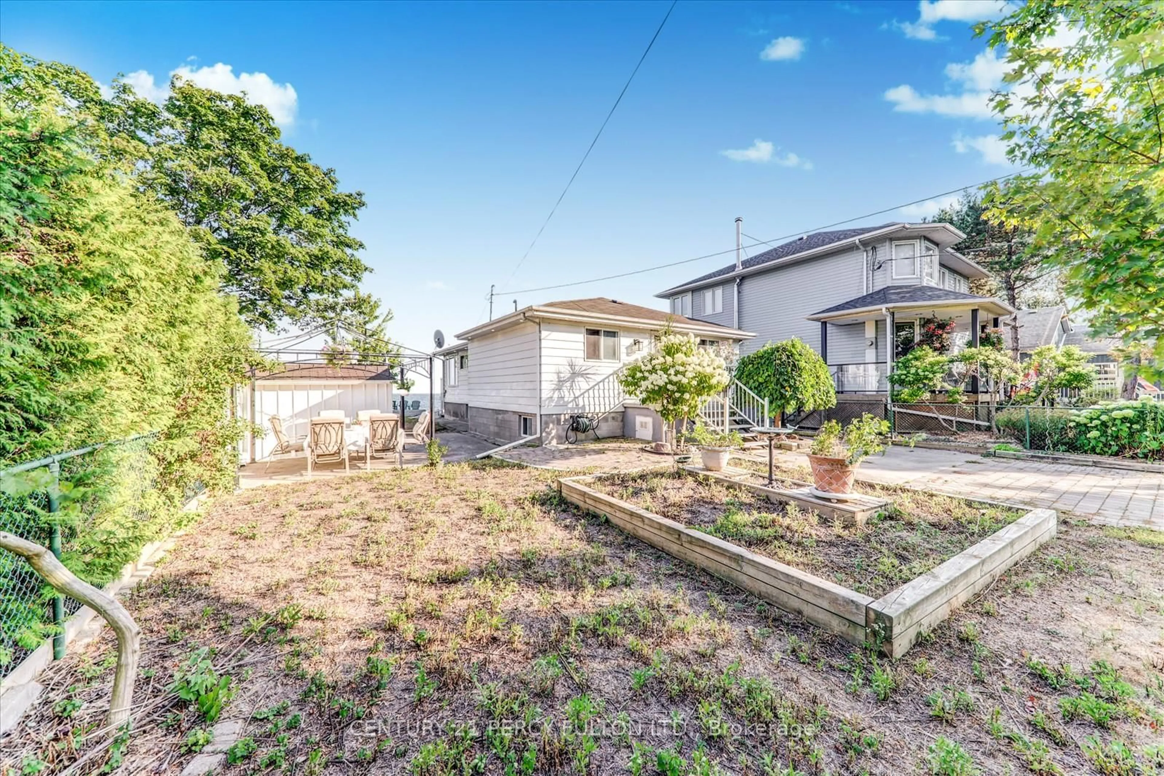 A pic from outside/outdoor area/front of a property/back of a property/a pic from drone, street for 135 Cedar Crest Beach Rd, Clarington Ontario L1C 3K3