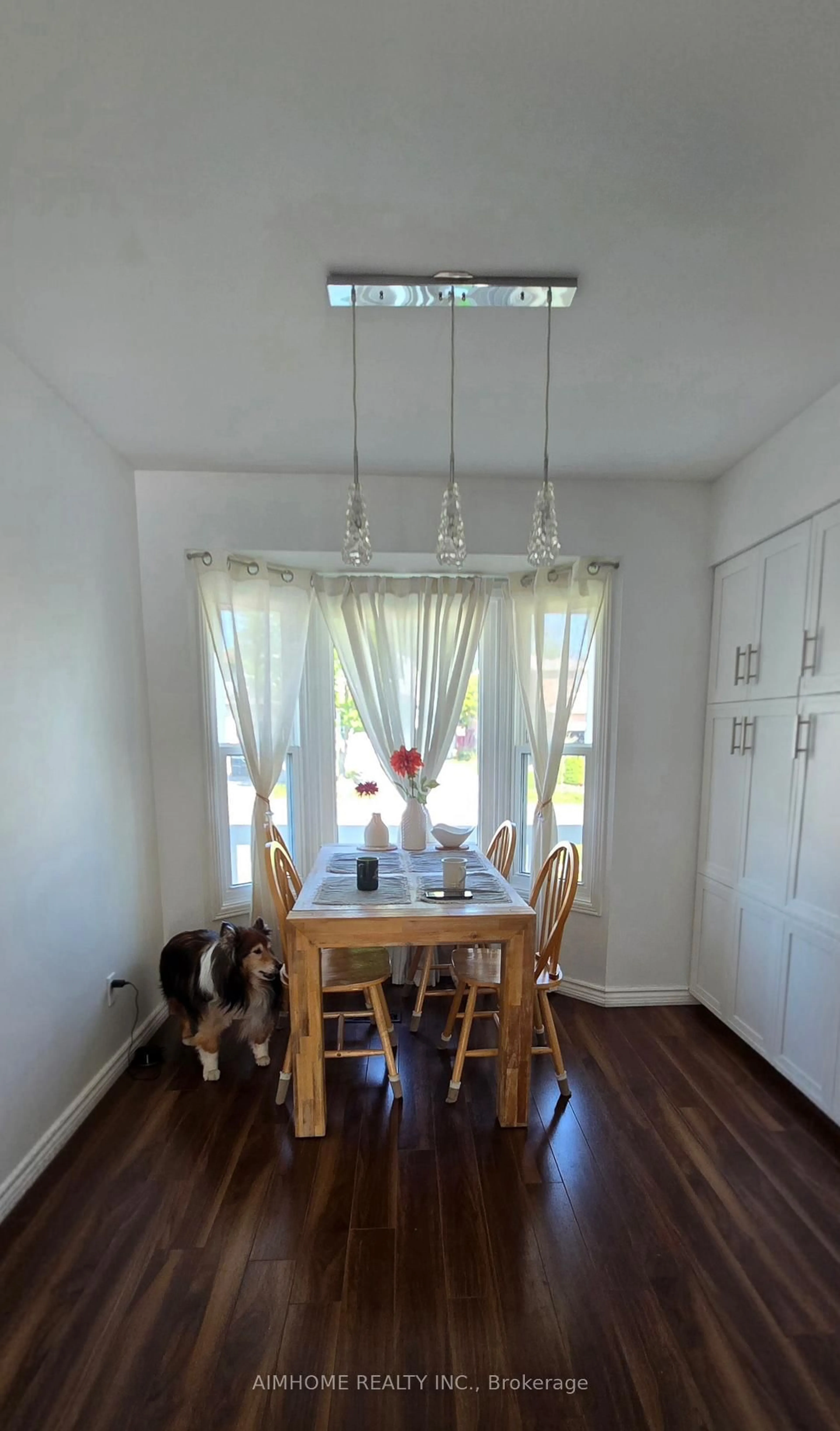 Dining room, wood/laminate floor for 854 Attersley Dr, Oshawa Ontario L1K 1T9