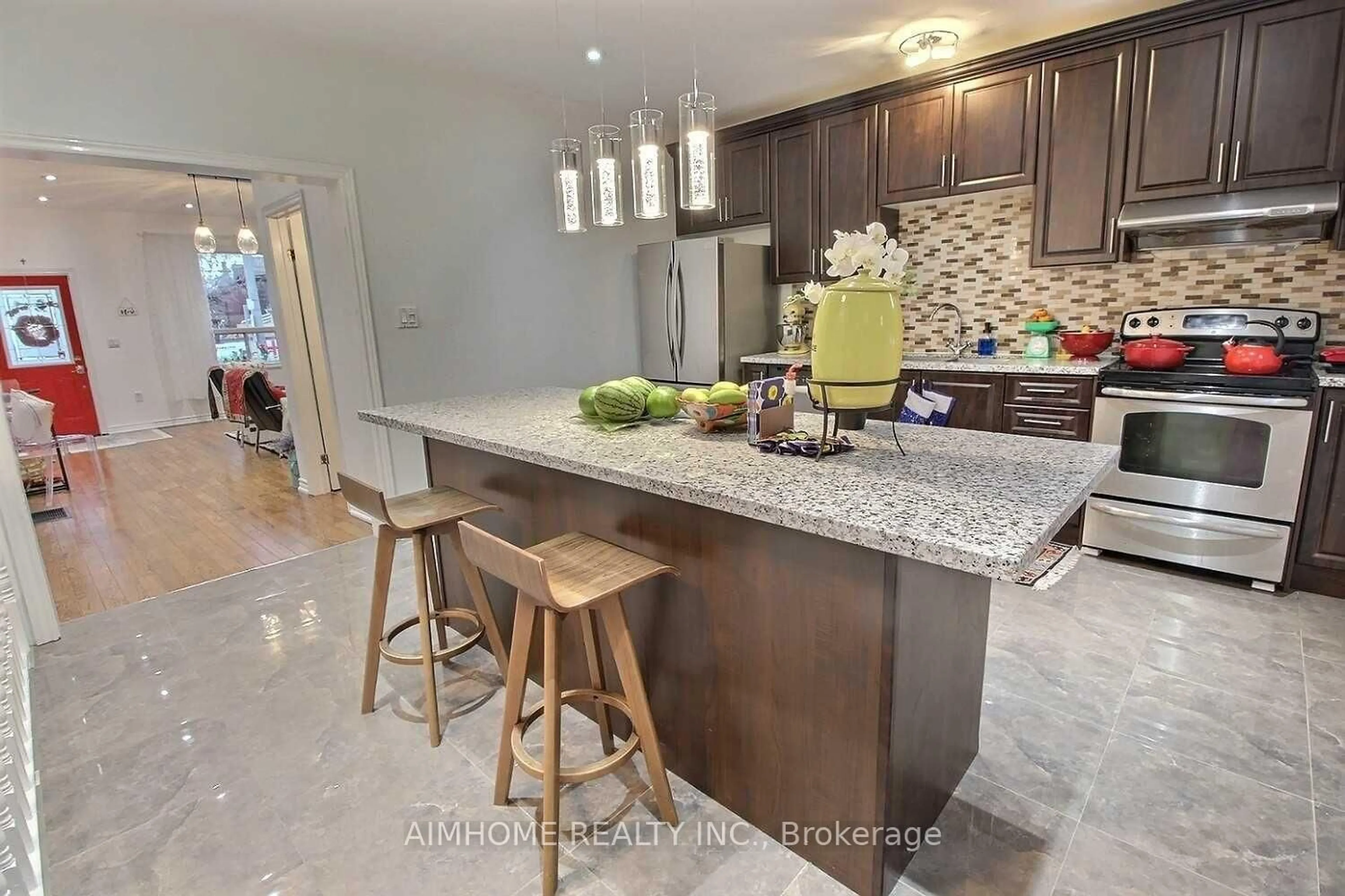 Open concept kitchen, ceramic/tile floor for 966 Dundas St, Toronto Ontario M4M 1R5