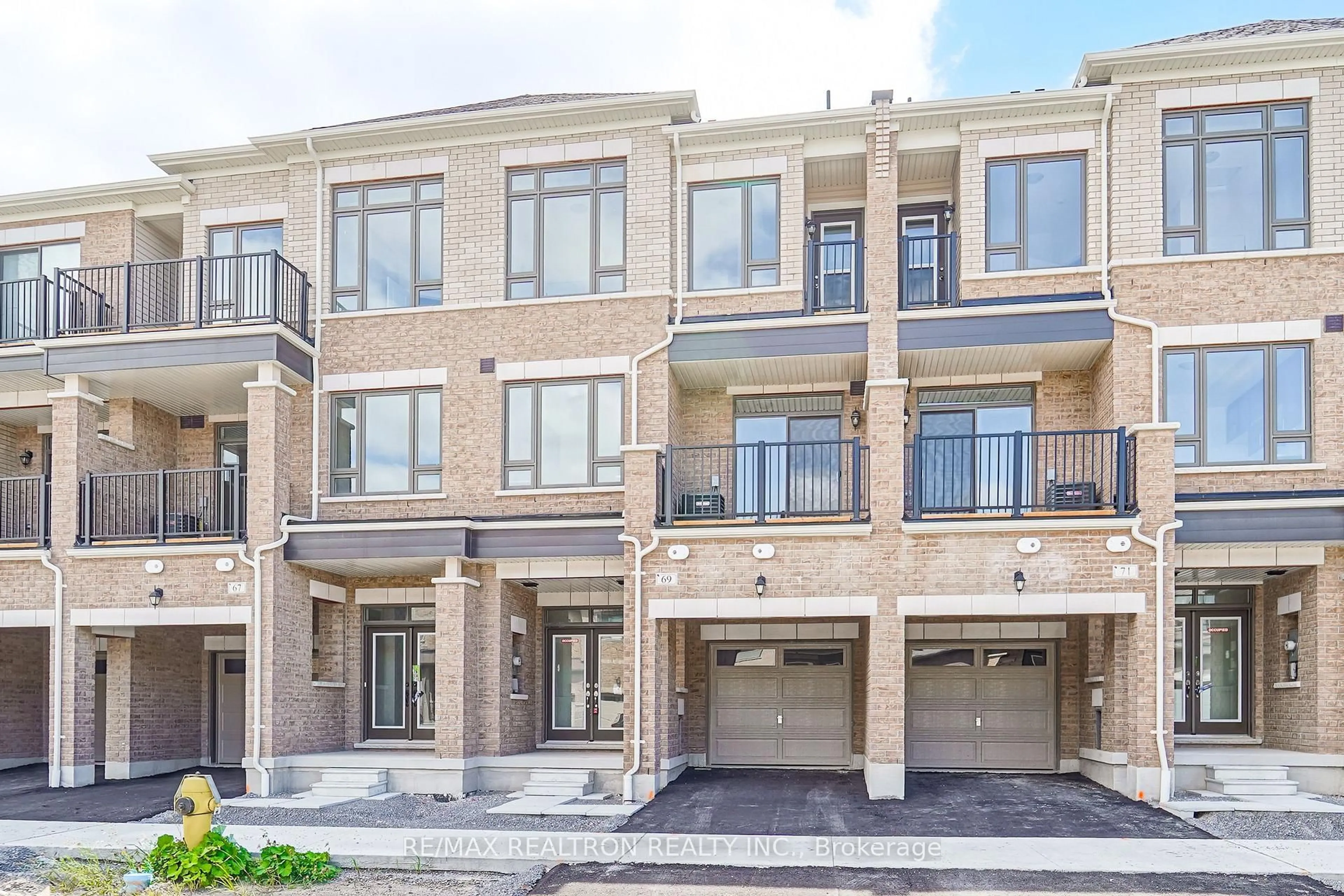 Home with brick exterior material, street for 69 McGowan Dr, Whitby Ontario L1P 0S2