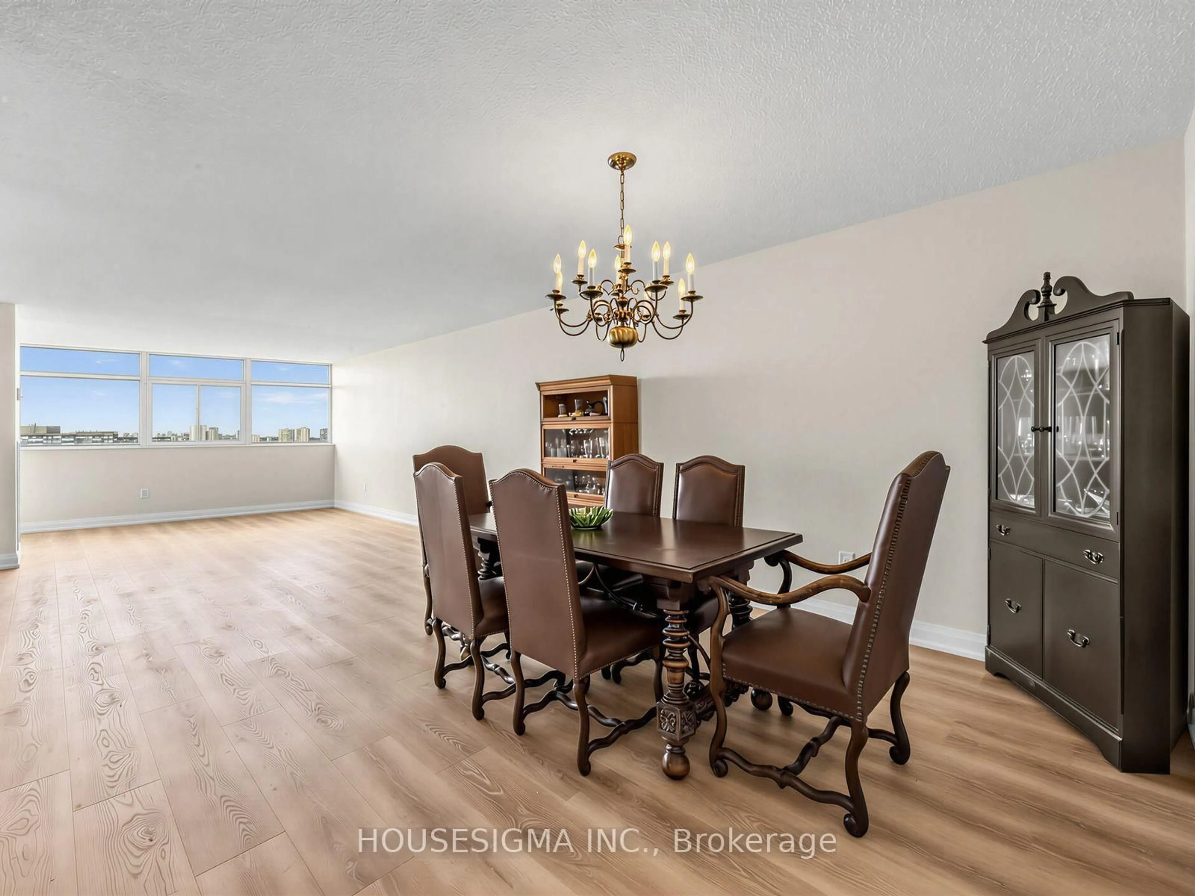 Dining room, wood/laminate floor for 3151 Bridletowne Circ #2307, Toronto Ontario M1W 2T1