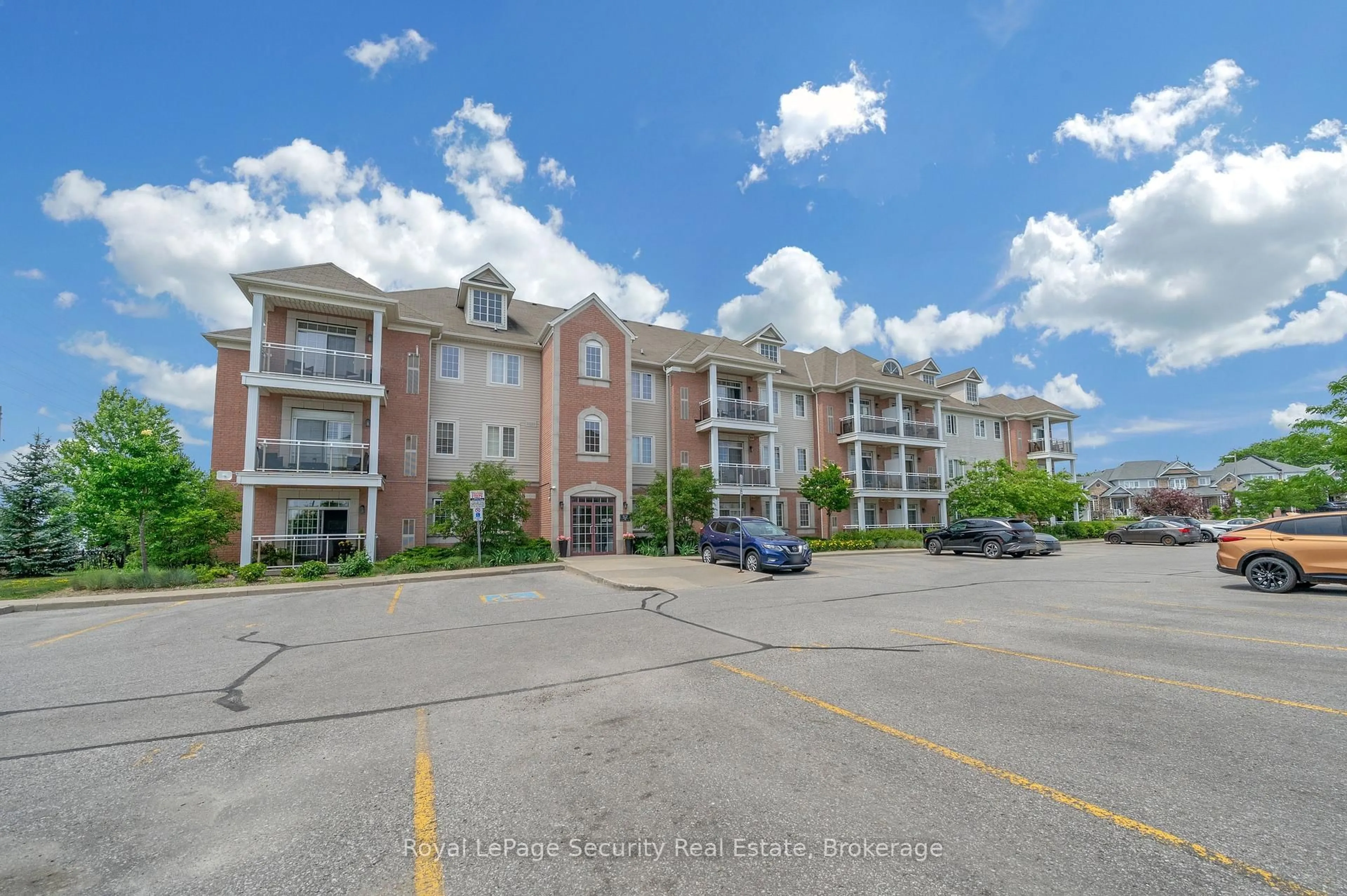 A pic from outside/outdoor area/front of a property/back of a property/a pic from drone, unknown for 52 Harvey Johnston Way #101, Whitby Ontario L1M 0J7